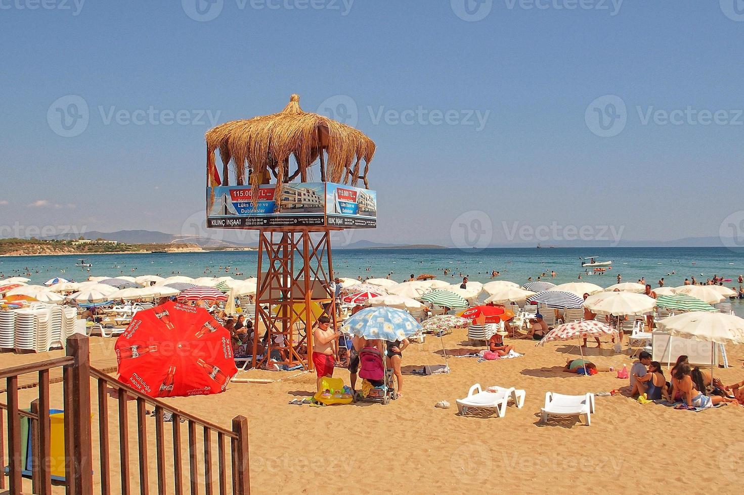 Altinkum beach in Didim, Turkey on a warm summer holiday day photo