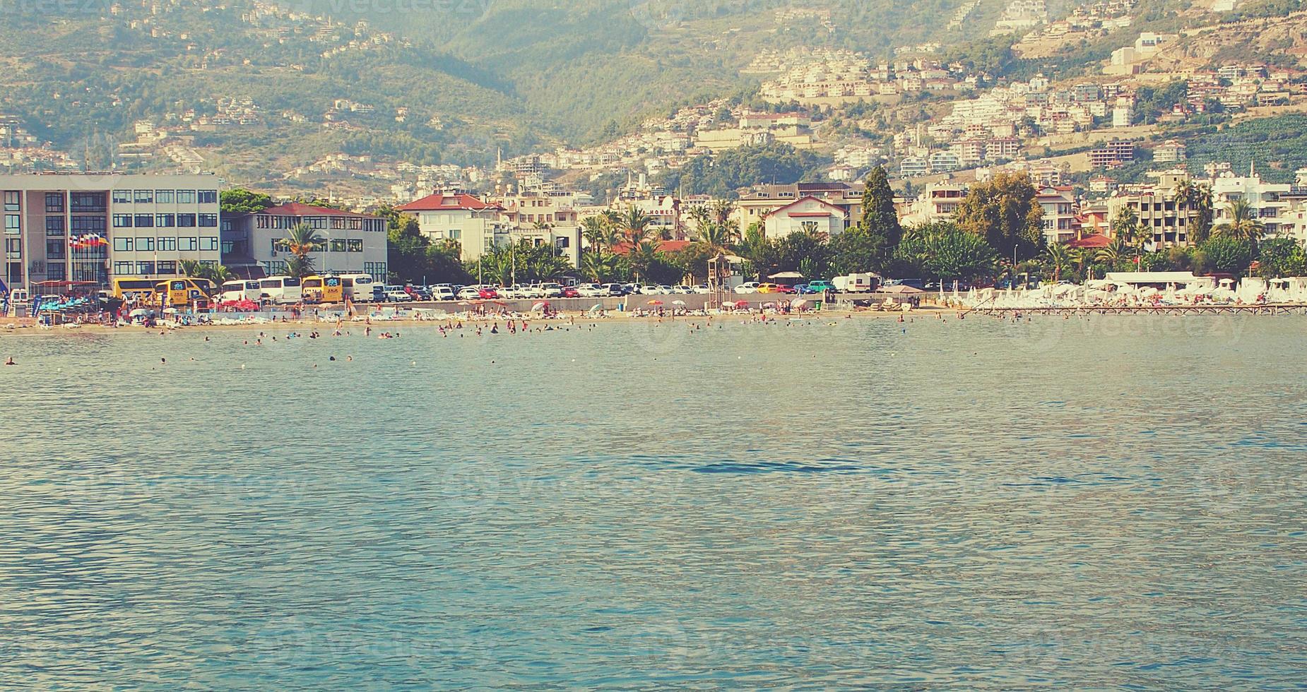 original landscape of the port and city of Alanya in Turkey from the sea photo