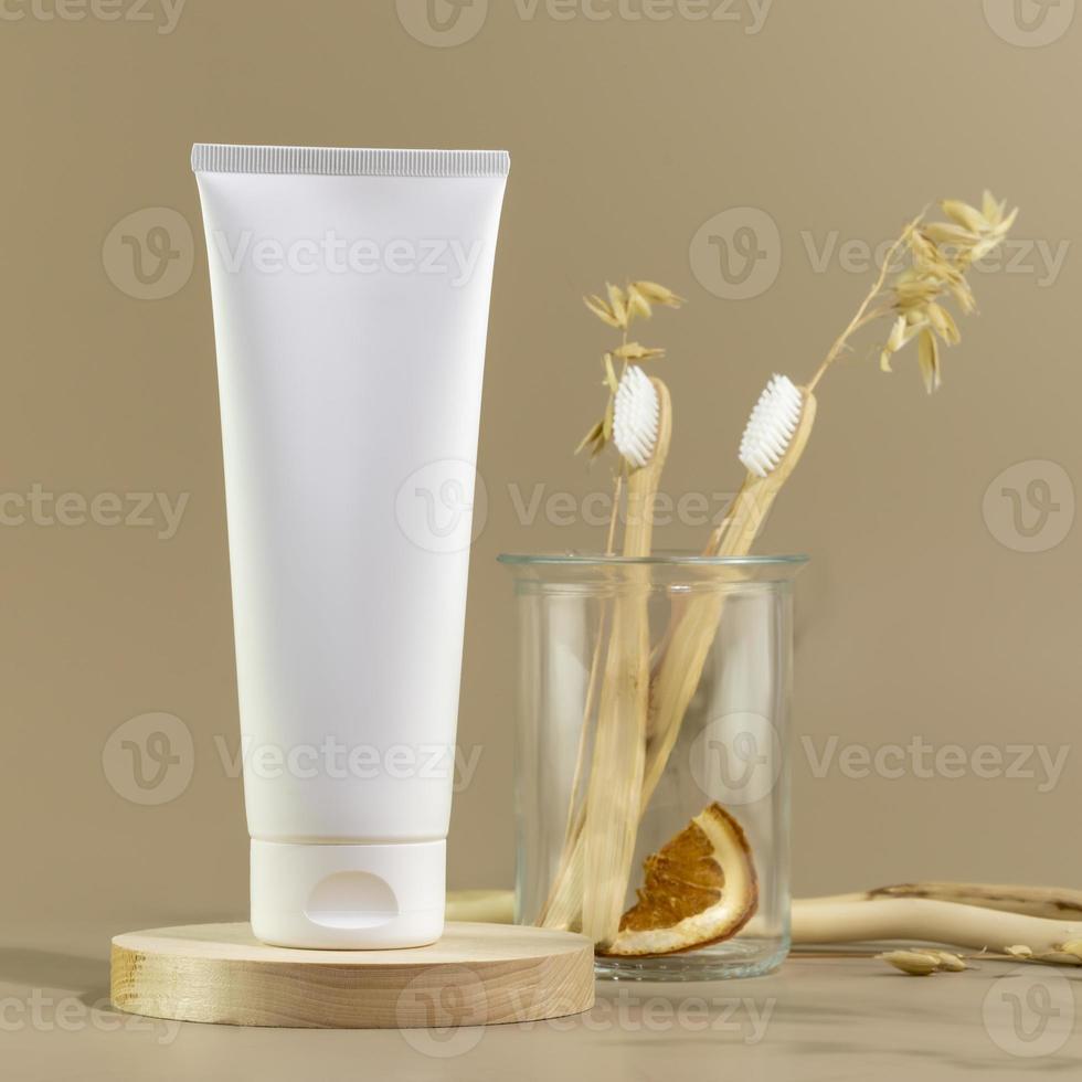 Eco friendly still life with natural toothpaste and toothbrushes photo