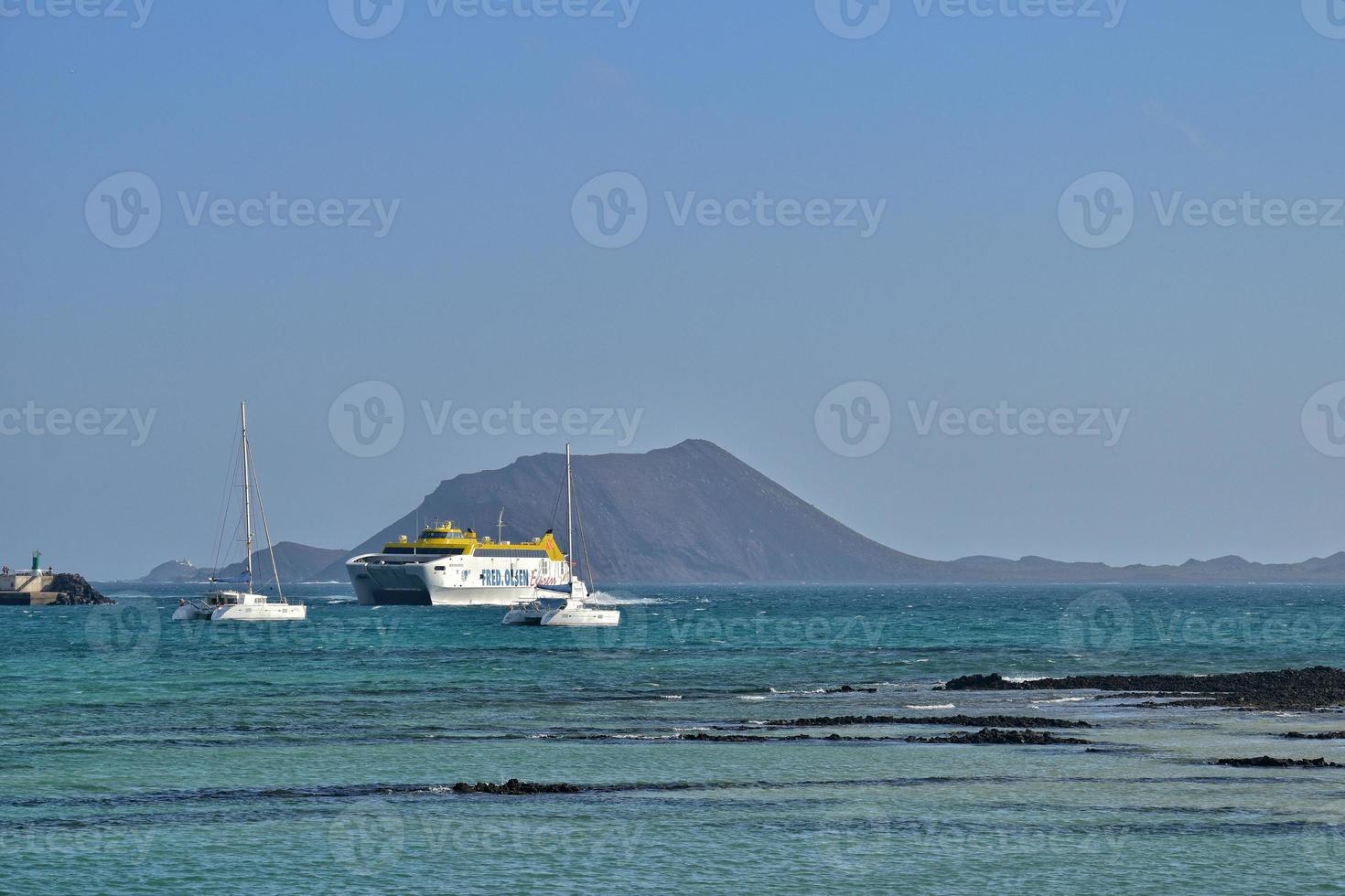 view of the beach and blue ocean on the Canary Island Fuerteventura in Spain photo