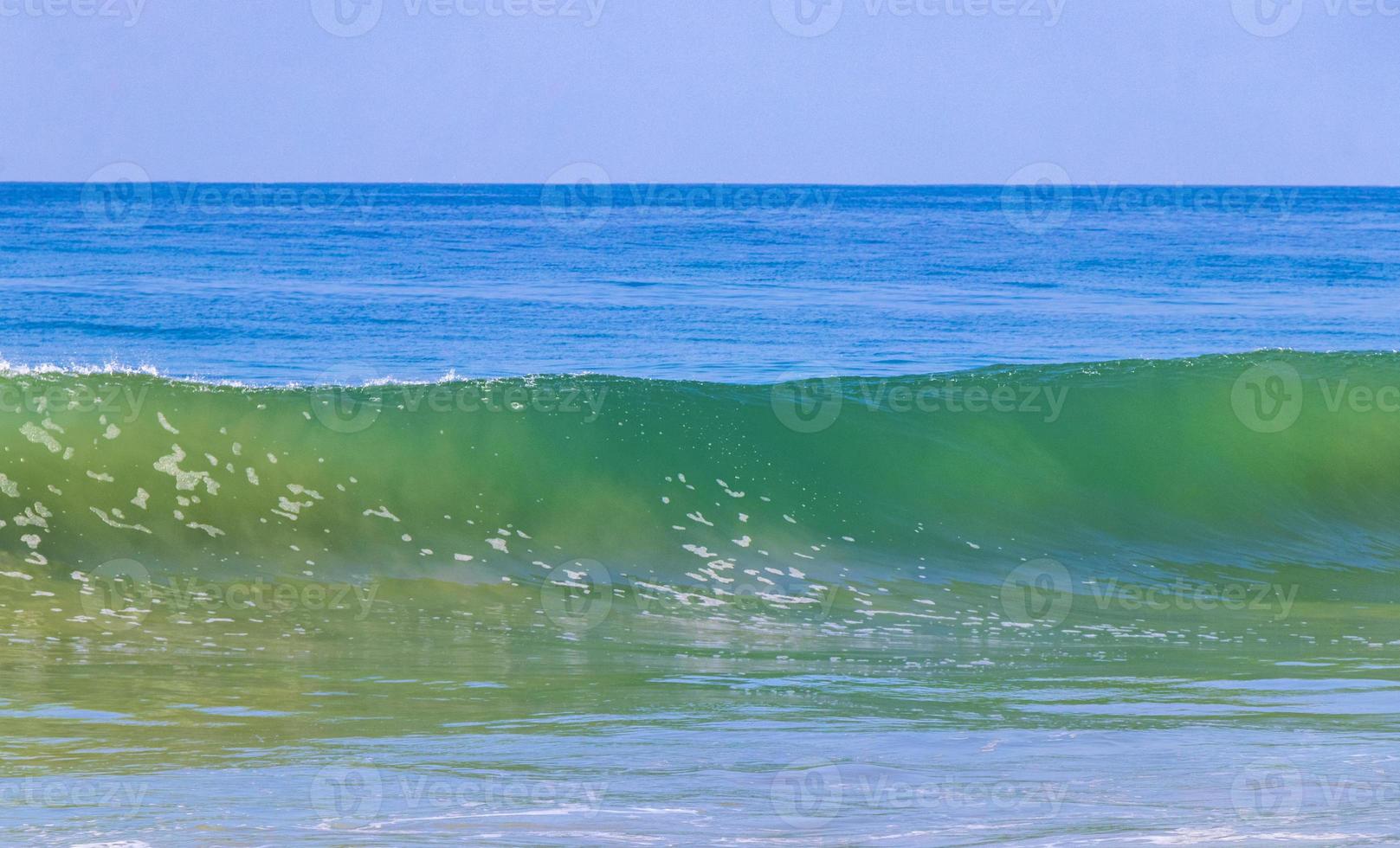 Extremely huge big surfer waves at beach Puerto Escondido Mexico. photo