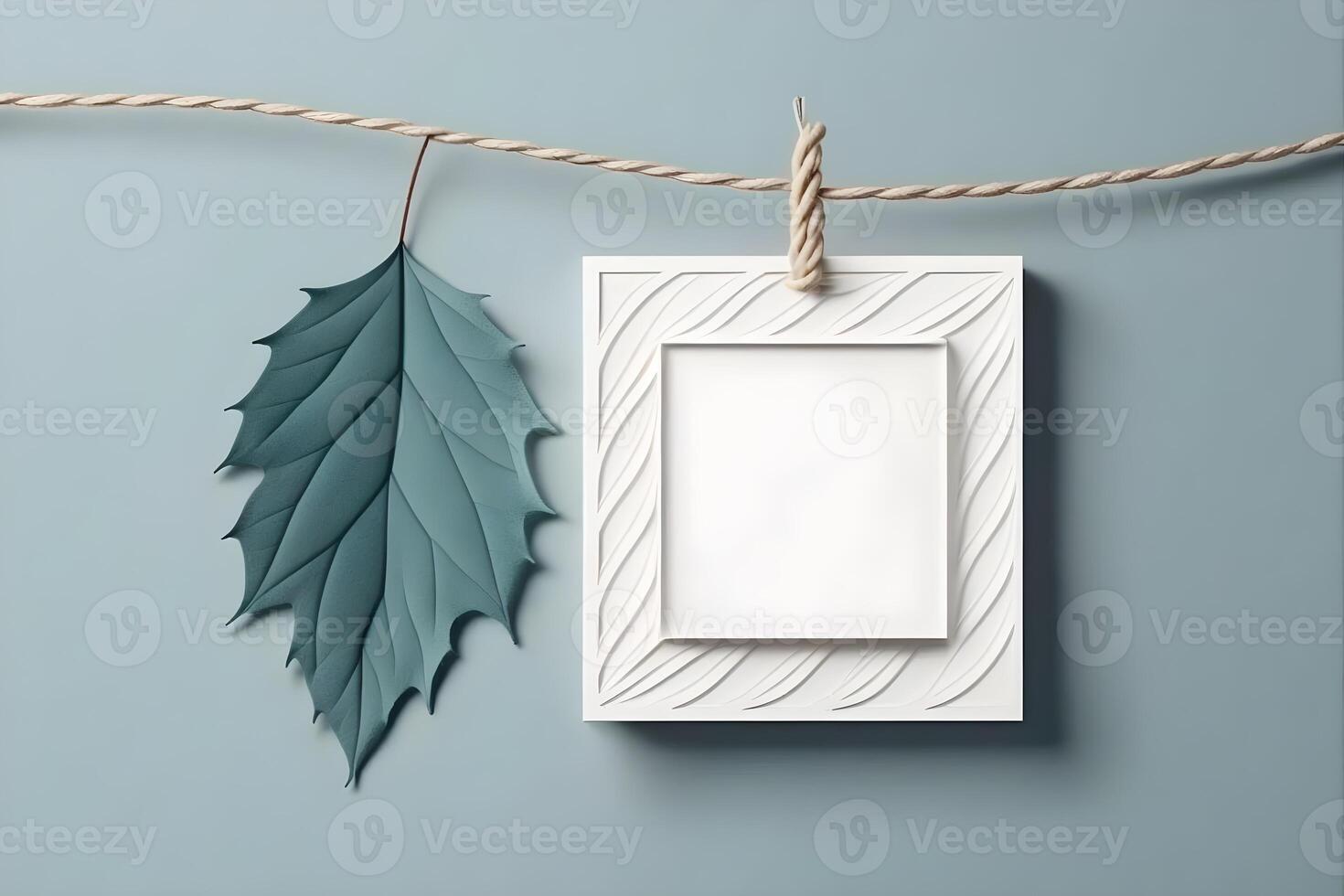 blank white frame on a pastel colored wall . photo