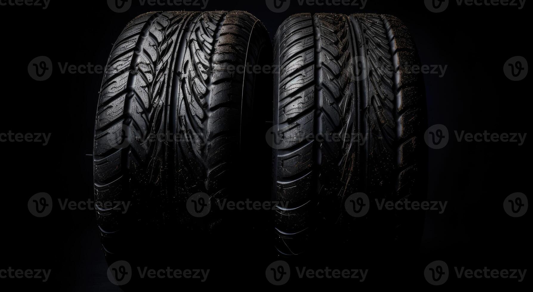 New car tires. Group of road wheels on dark background. Summer Tires with asymmetric tread design. Driving car concept. . photo