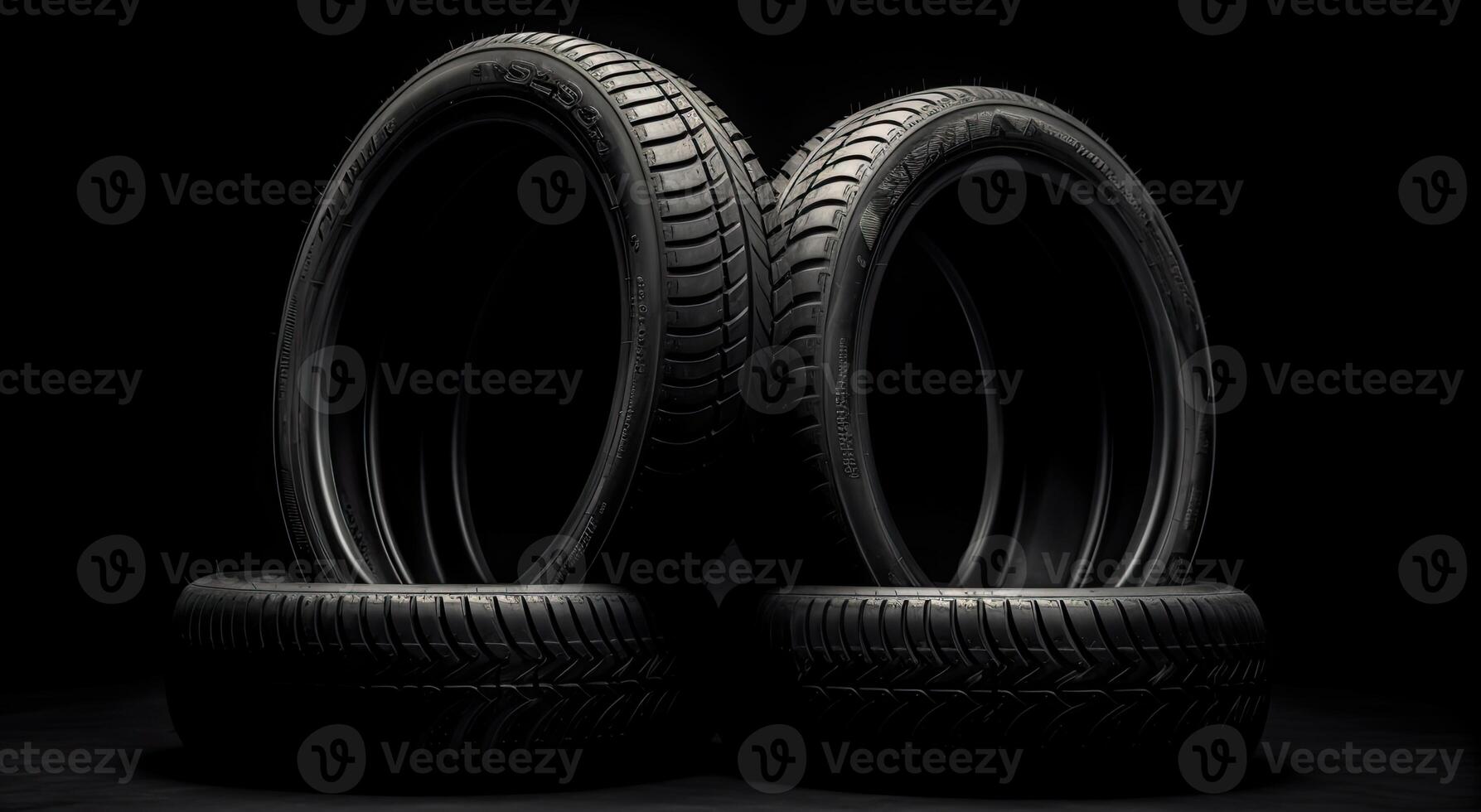 New car tires. Group of road wheels on dark background. Summer Tires with asymmetric tread design. Driving car concept. . photo