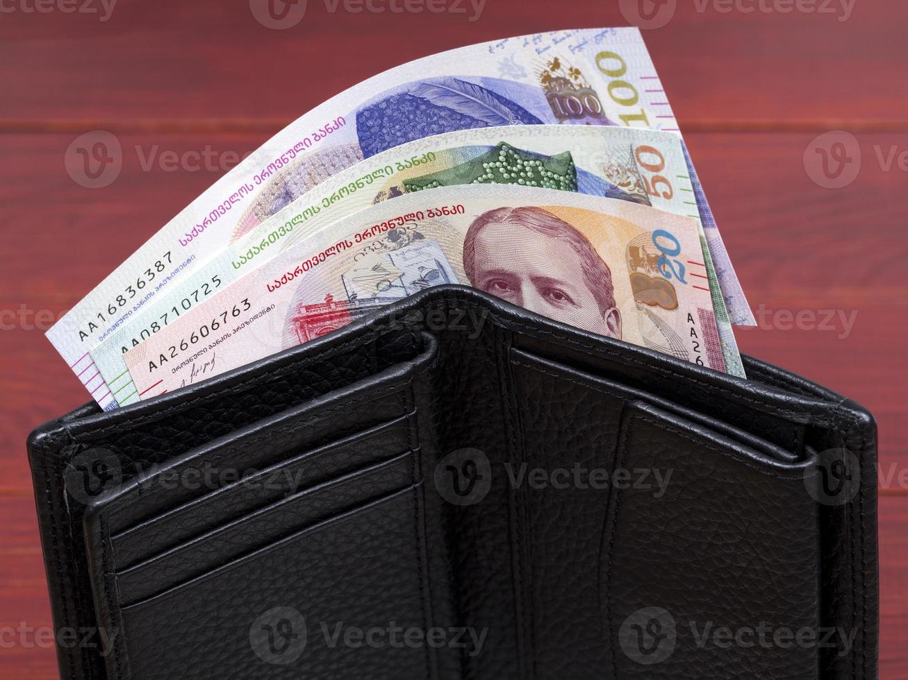 Georgian lari in the black wallet photo
