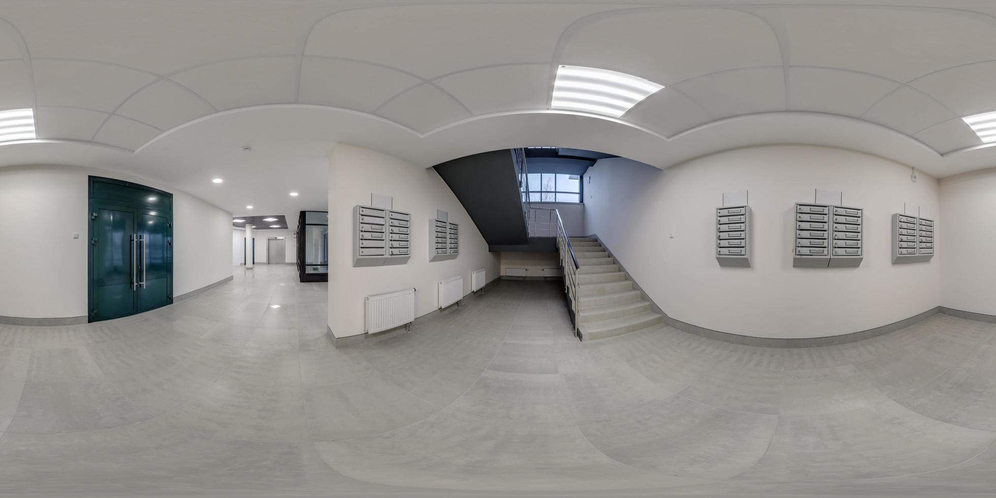 full seamless spherical hdri 360 panorama view in empty modern hall with columns and staircase, doors and mailboxes in equirectangular projection, ready for AR VR content photo