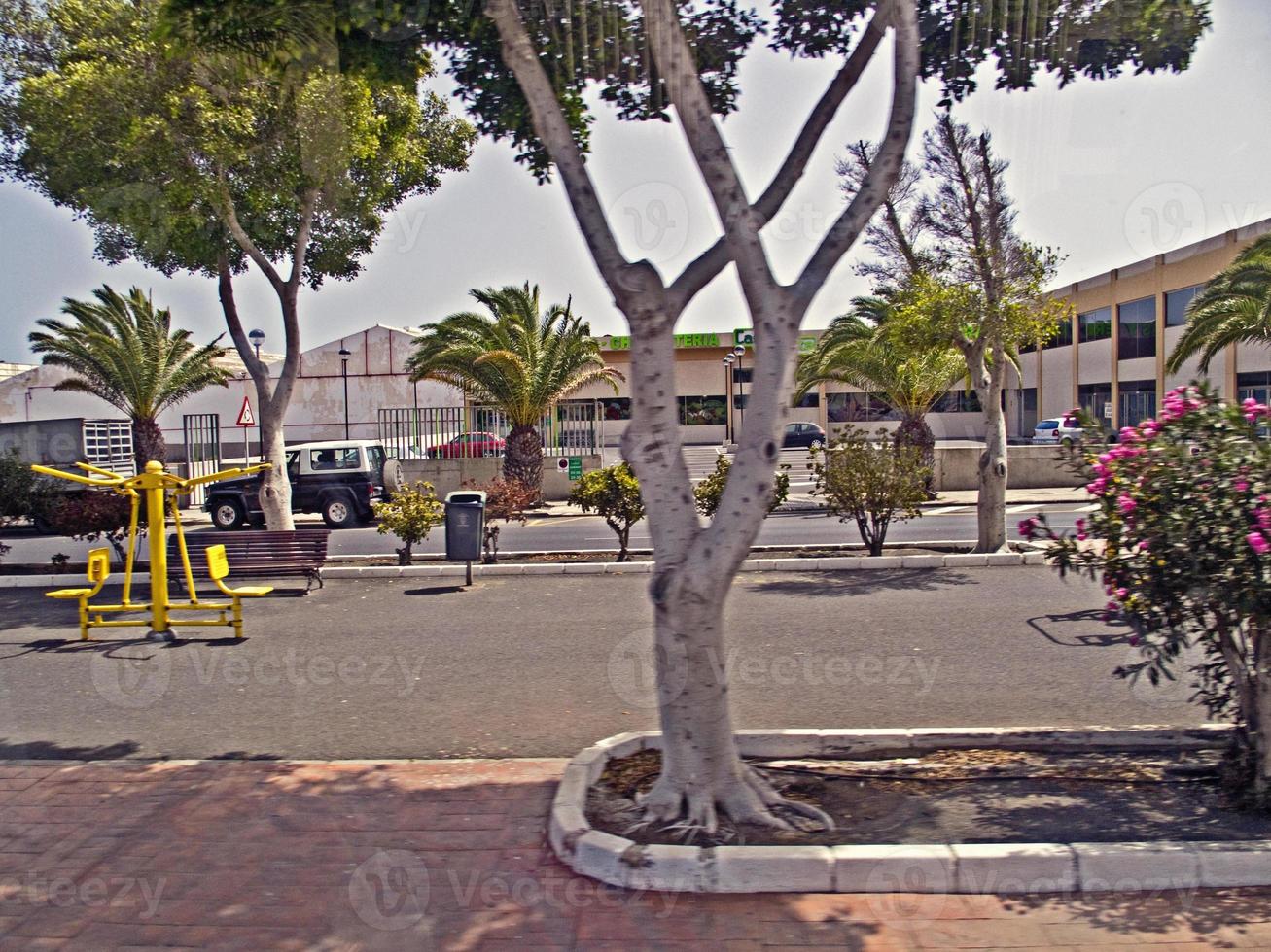 scenery with the city's characteristic white buildings from the Spanish island of Lanzarote on a warm summer day photo