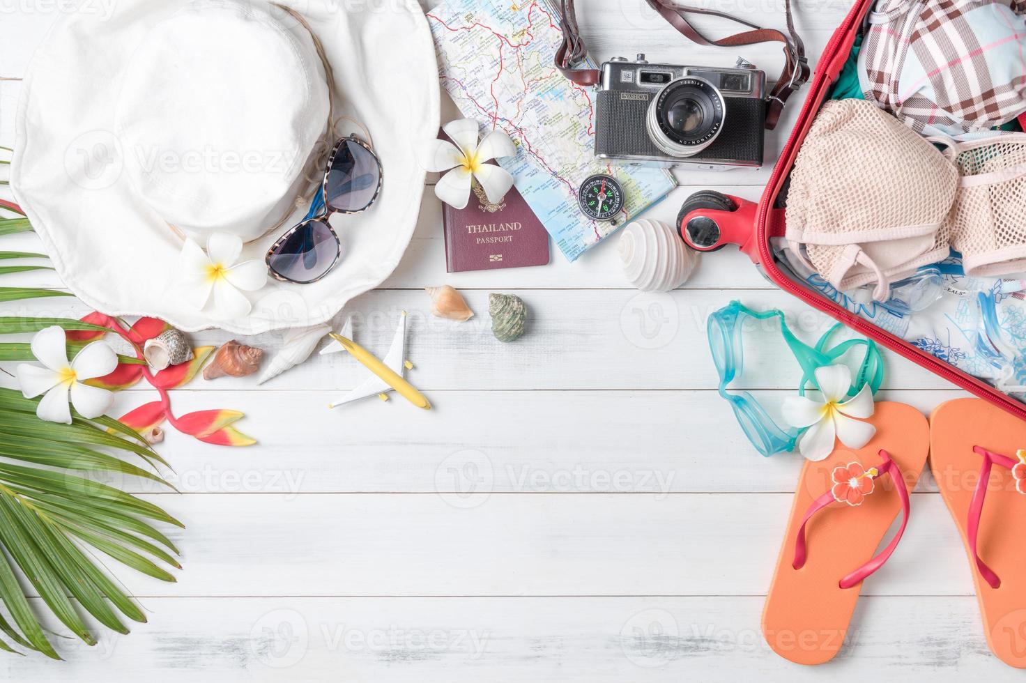 prepare accessories and travel items for summer trip photo