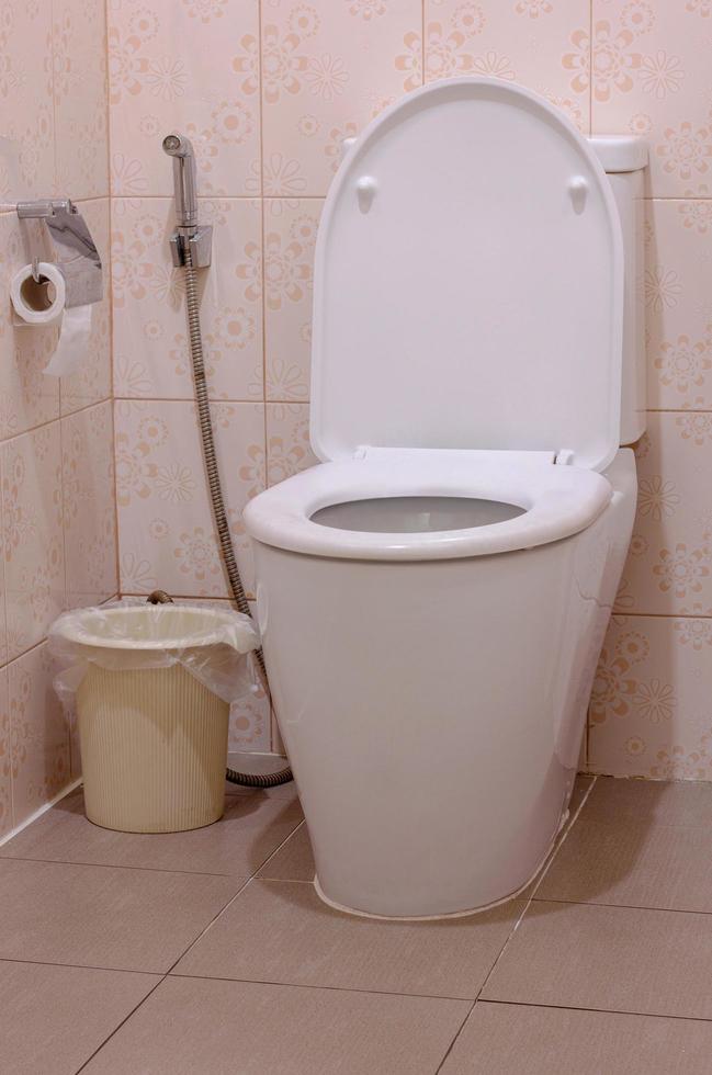 Toilet bowl in the bathroom interior photo