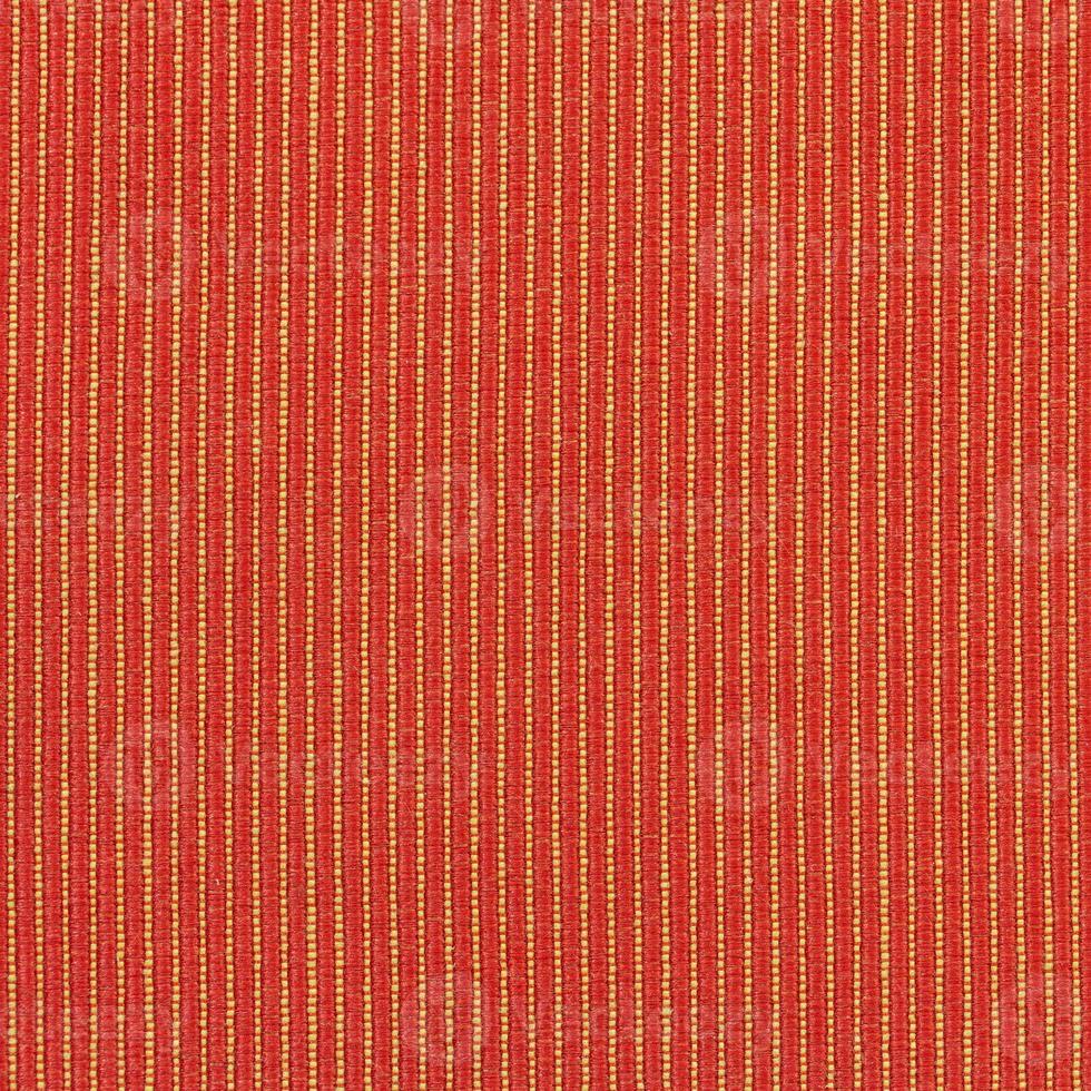 Detail of Seamless Red and Yellow Striped. Fabric Texture for Background photo