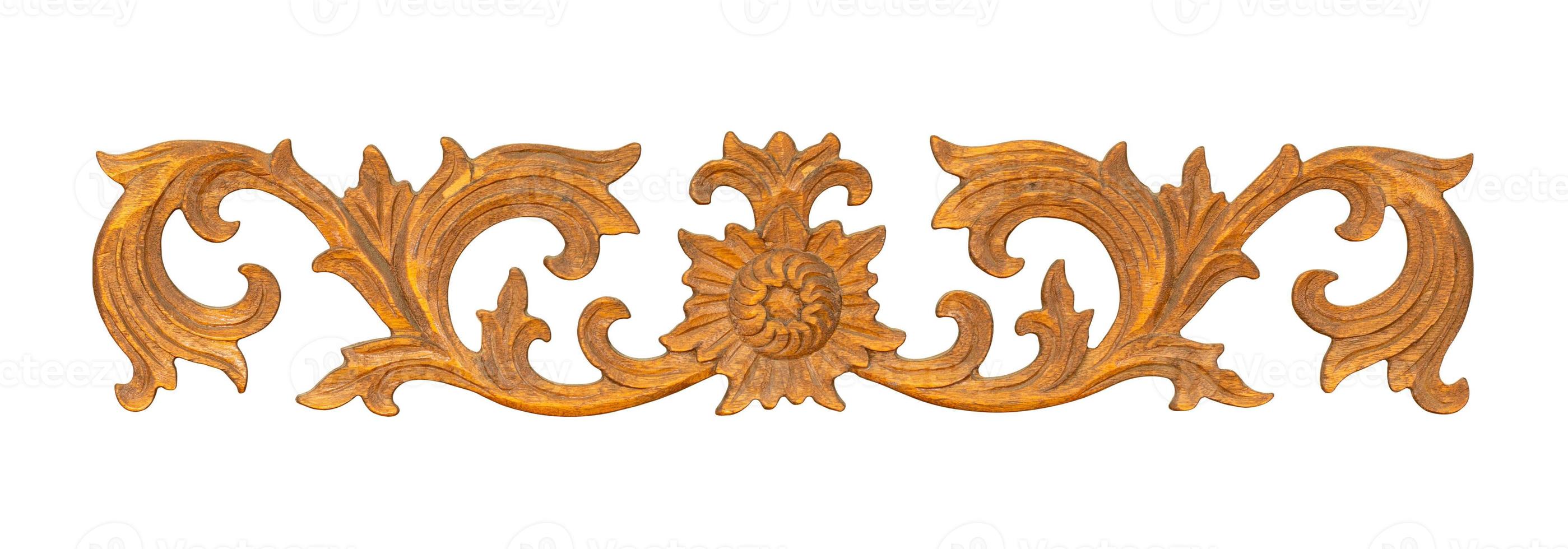 Pattern of flower carved on wood for decoration isolated on white background with clipping path photo