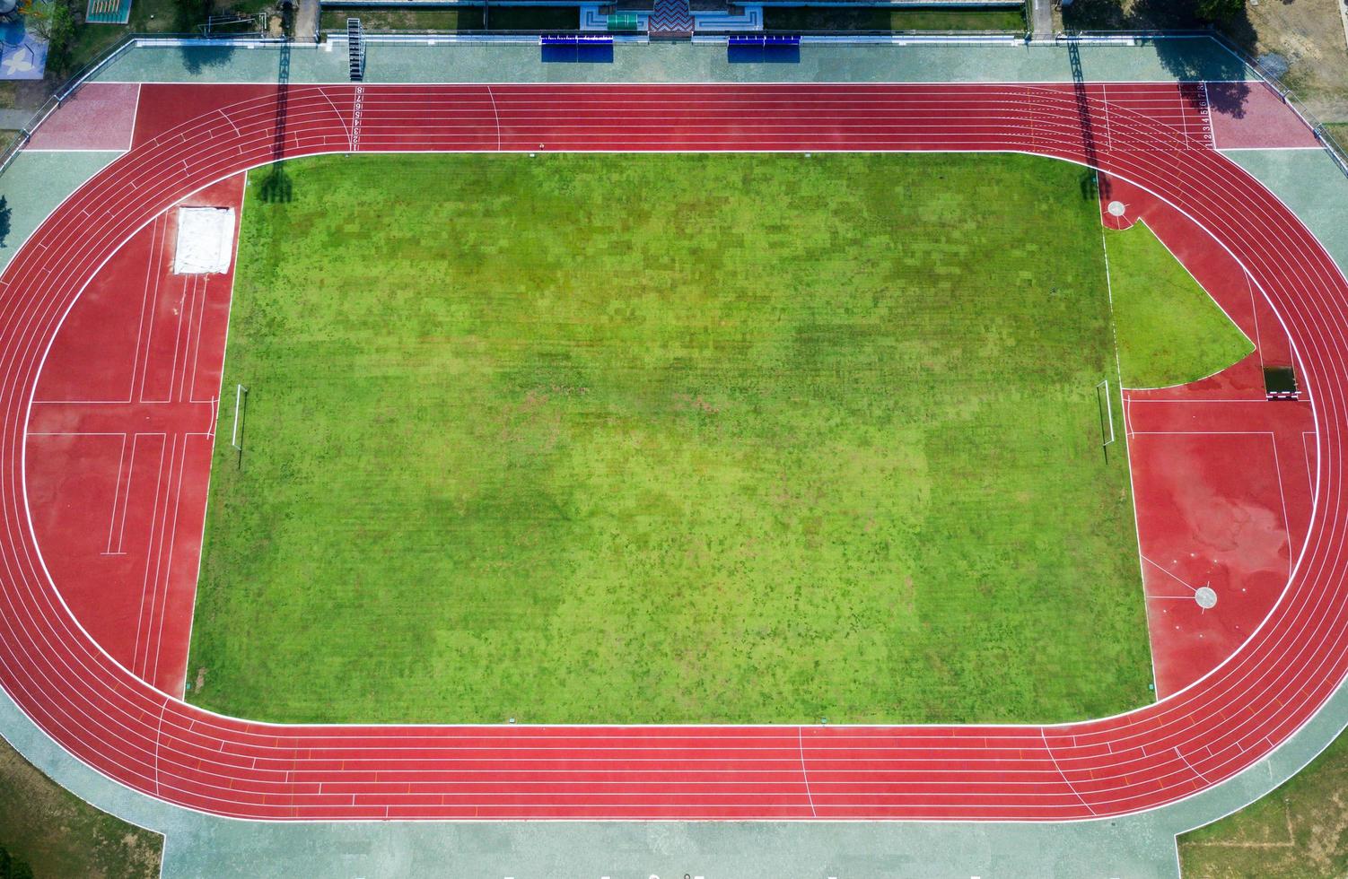football field in stadium on fine day photo