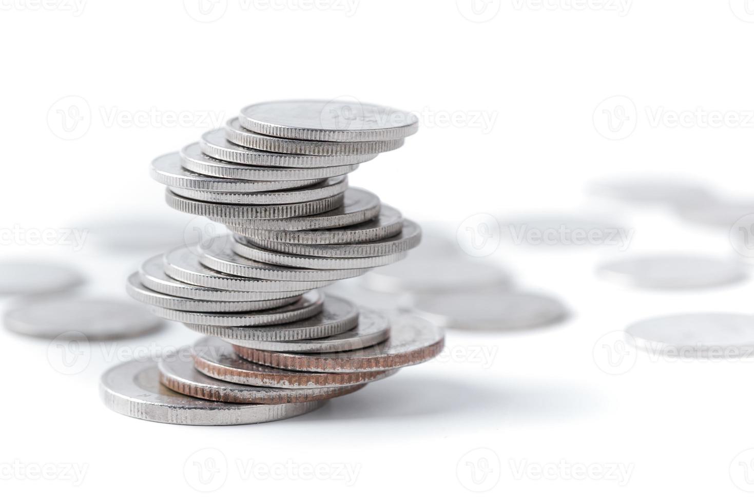 Coins stacked on each other in different positions. photo