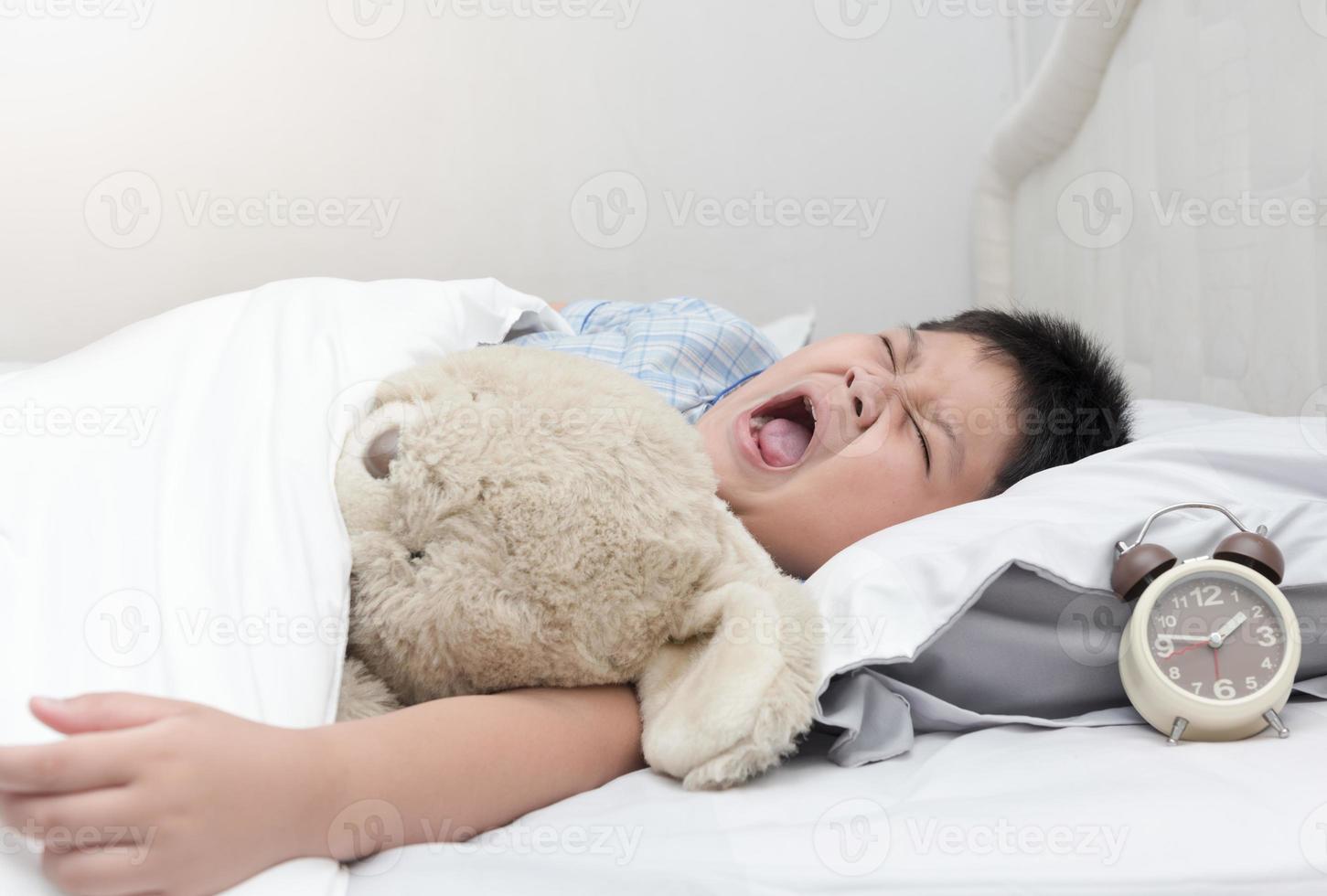 obese fat boy yawn and sleep in morning photo