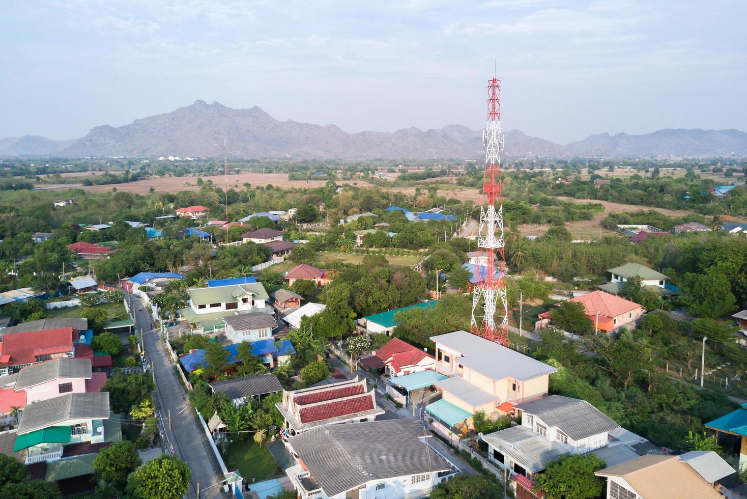 aerial view of tower mobile phone in village photo