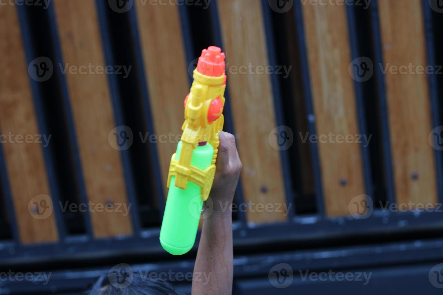 photo of toy gun being carried