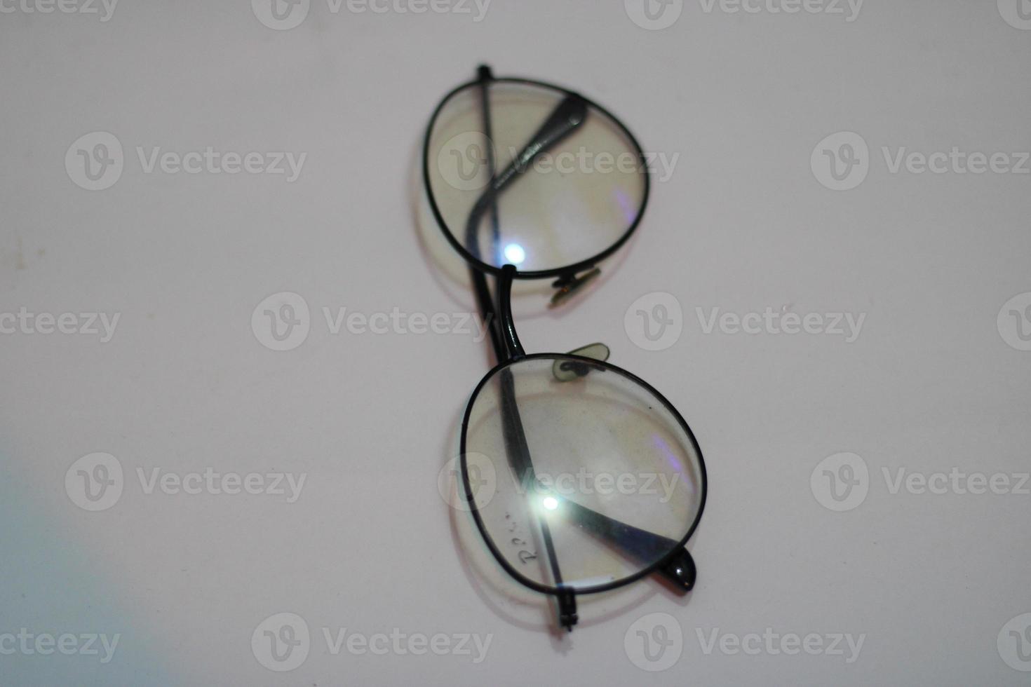 Photo of modern glasses with white background