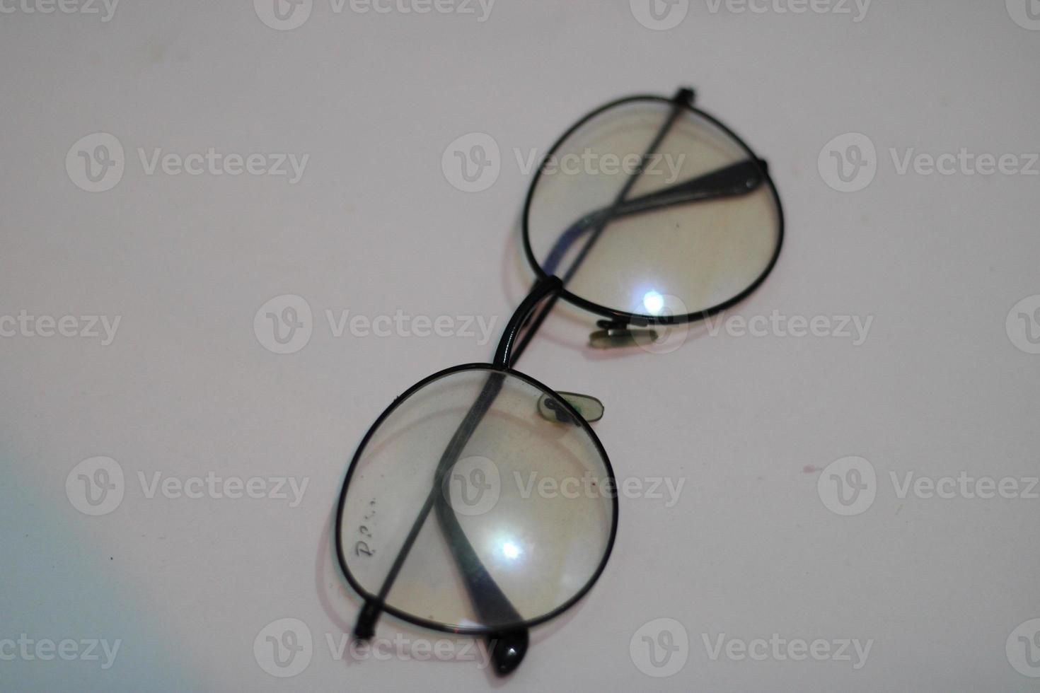 Photo of modern glasses with white background