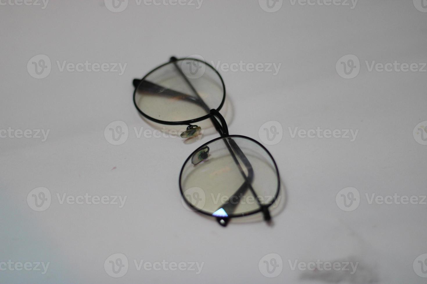 Photo of modern glasses with white background