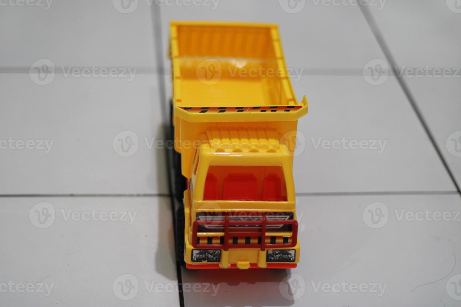 Photo of a yellow children's toy truck