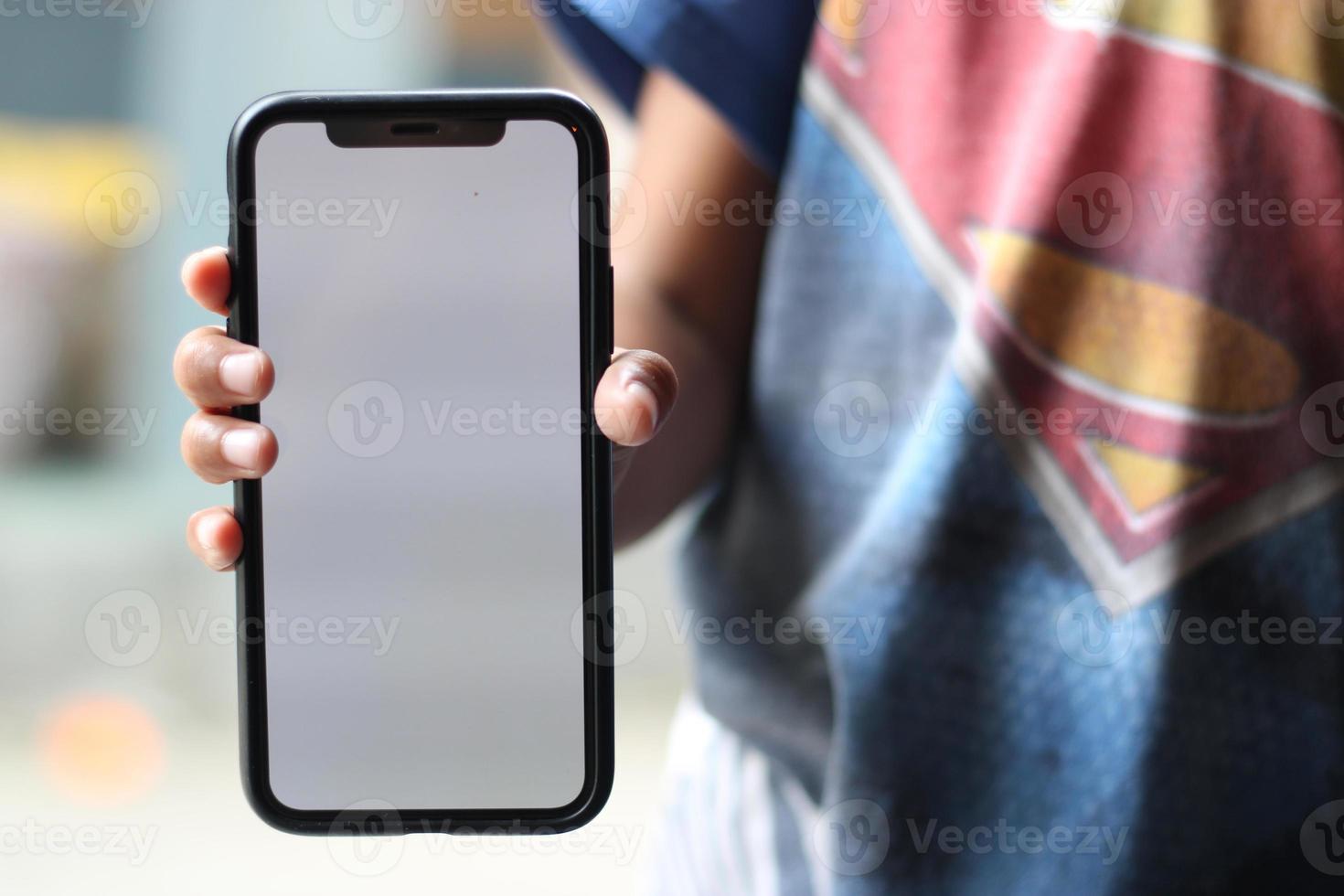 Photo of an empty cell phone held in hand