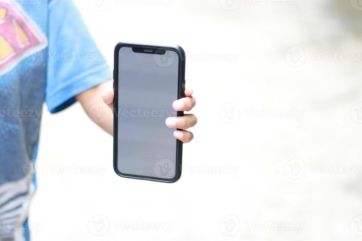 Photo of an empty cell phone held in hand