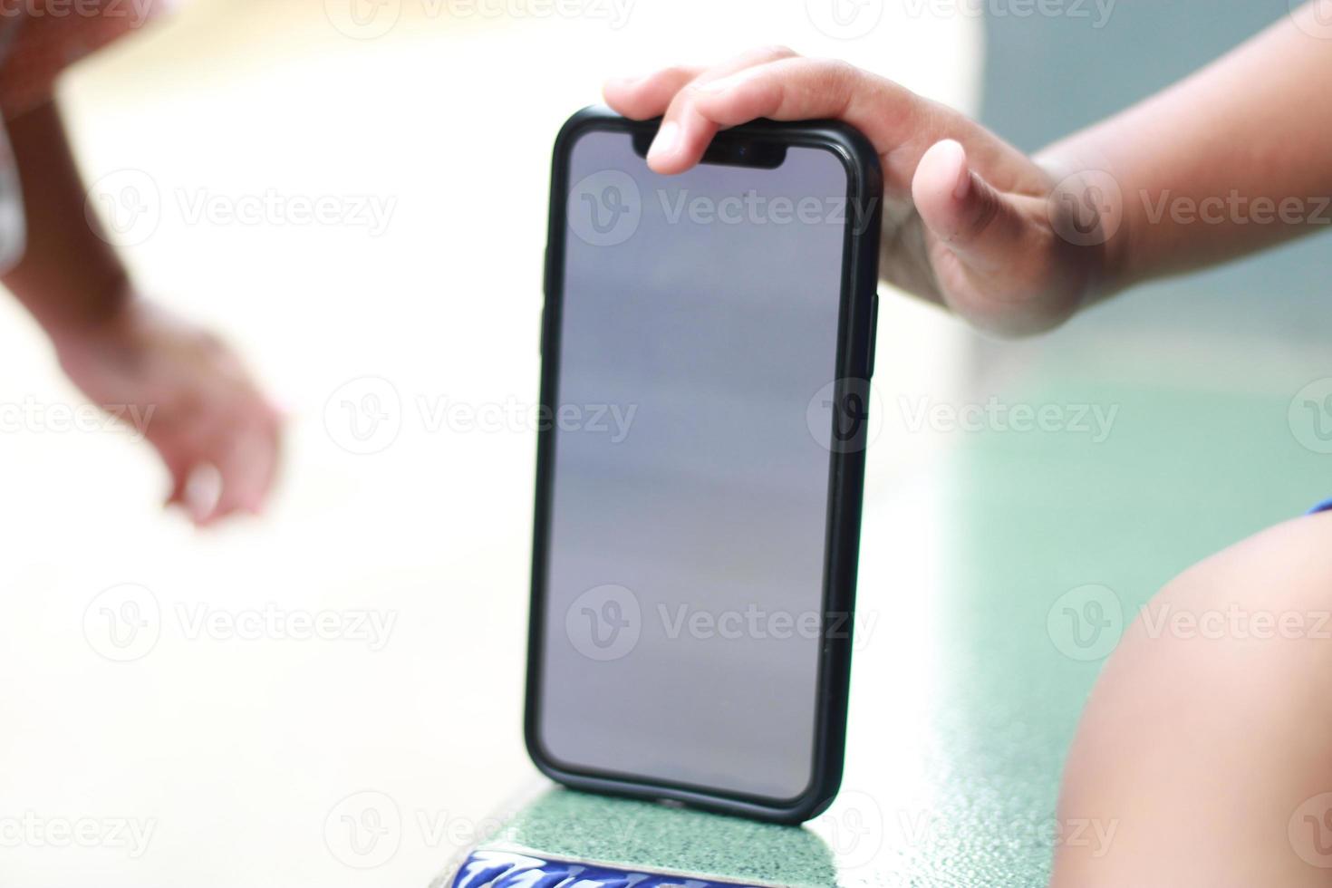 Photo of an empty cell phone held in hand