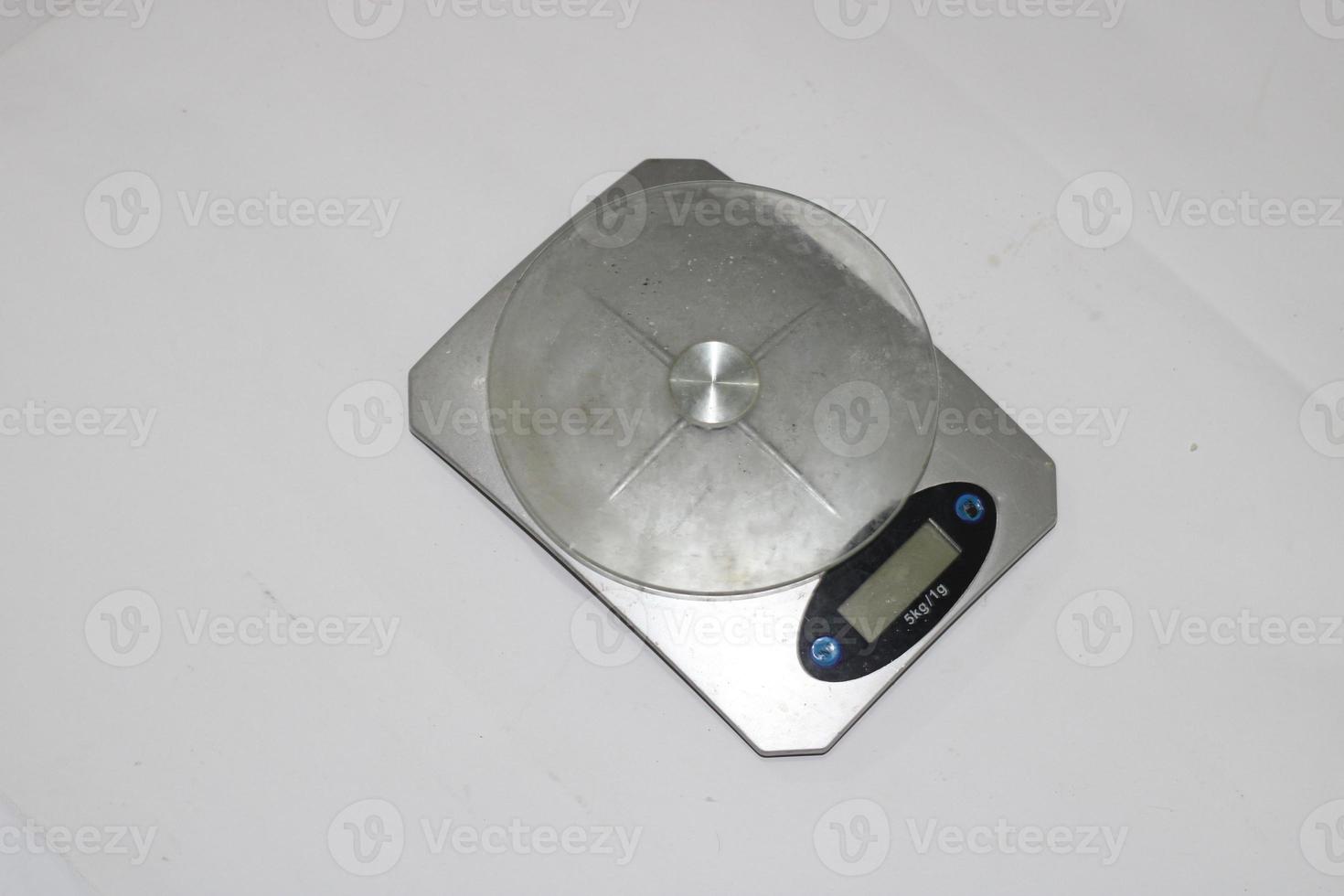 Photo of a digital scale with a white background