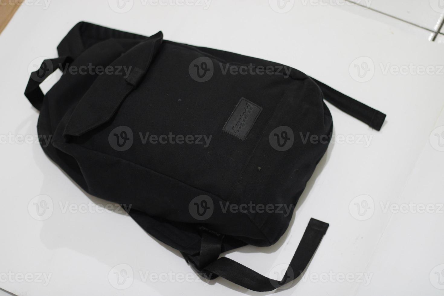 Photo of a black bag on a white background