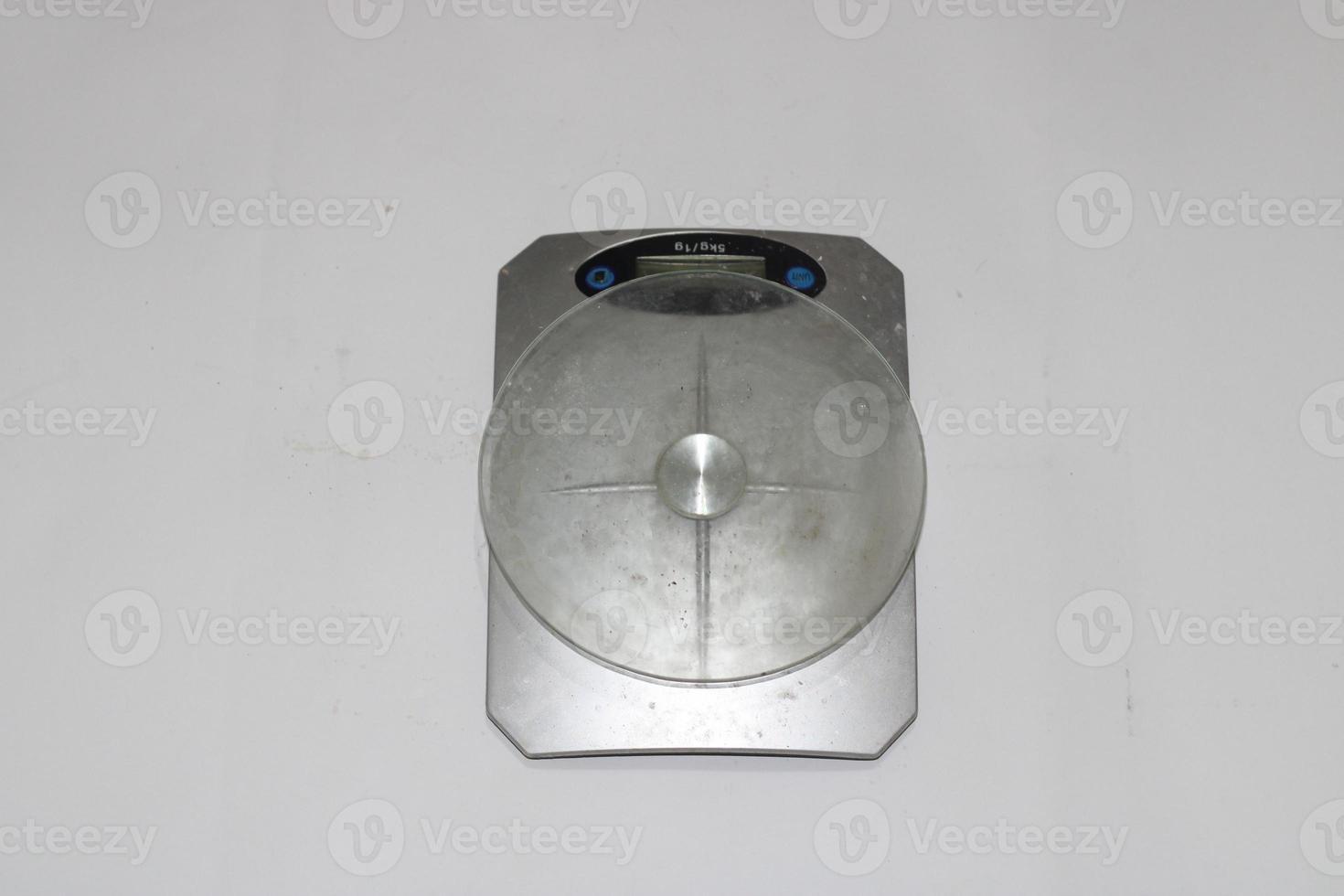 Photo of a digital scale with a white background