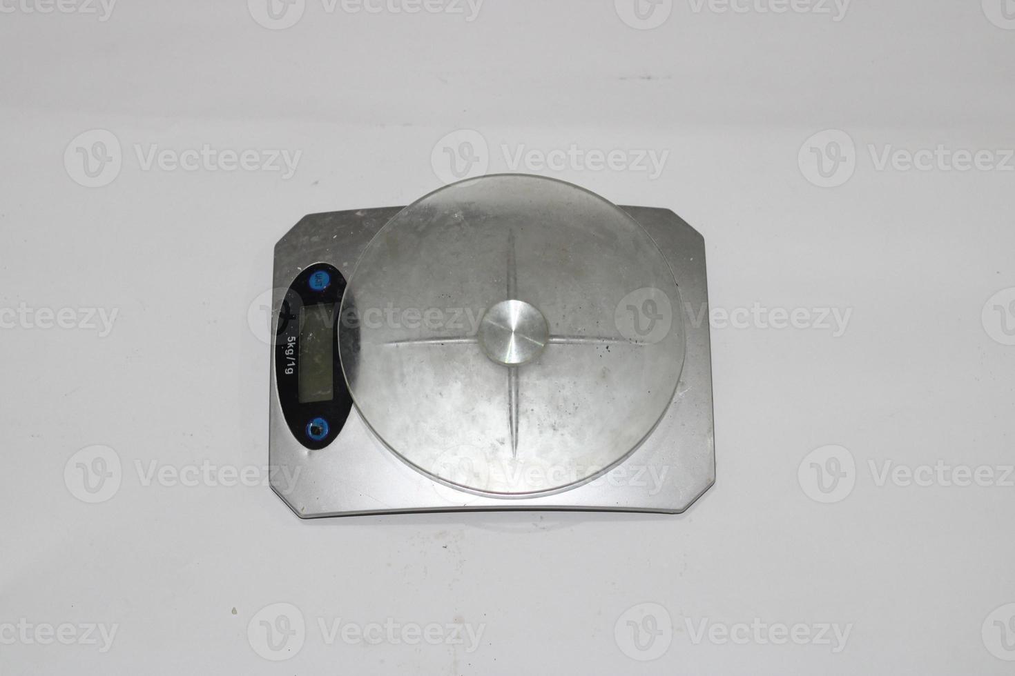 Photo of a digital scale with a white background