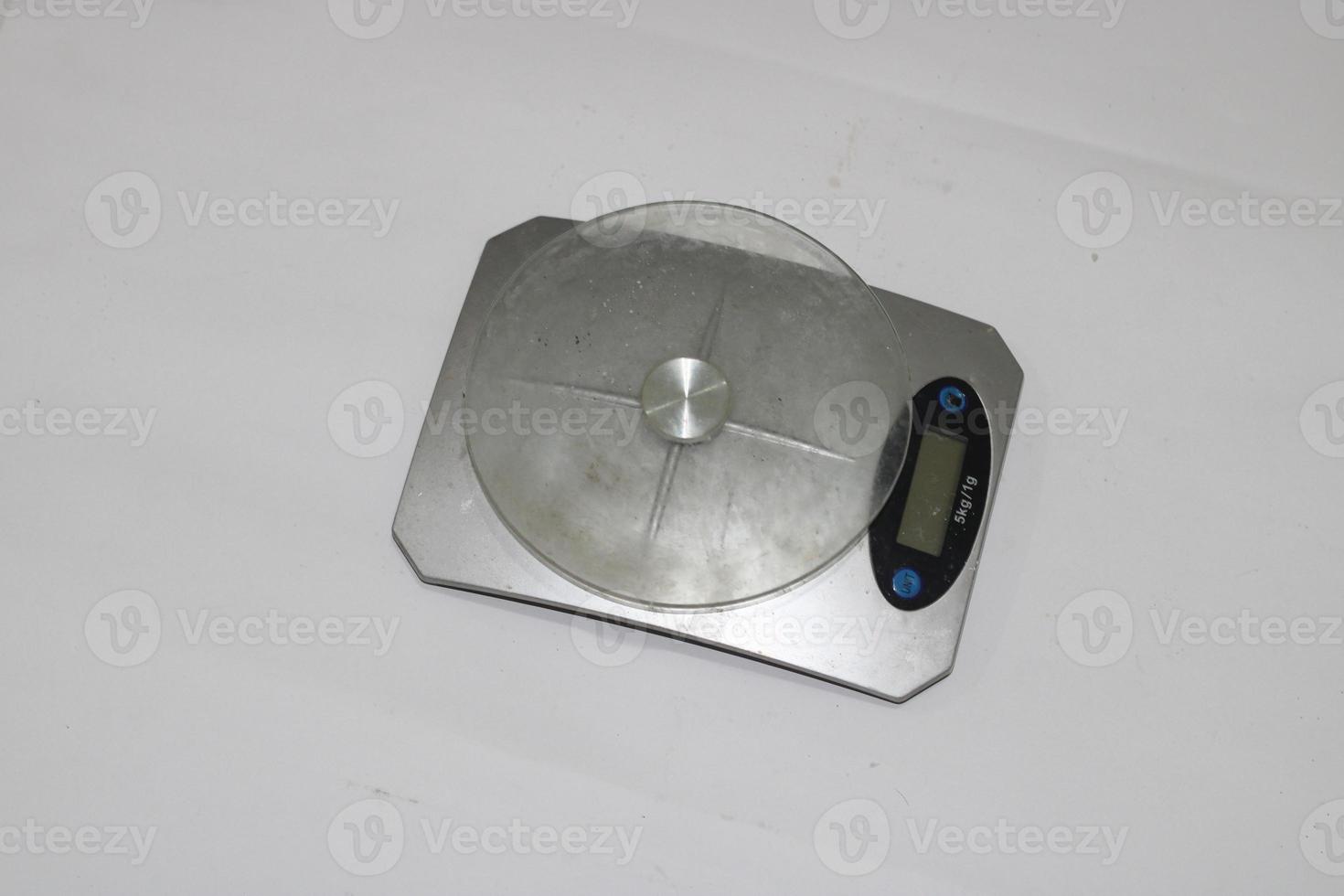 Photo of a digital scale with a white background