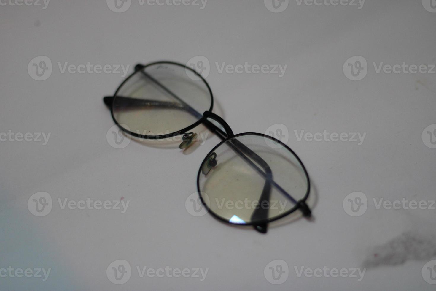 Photo of modern glasses with white background