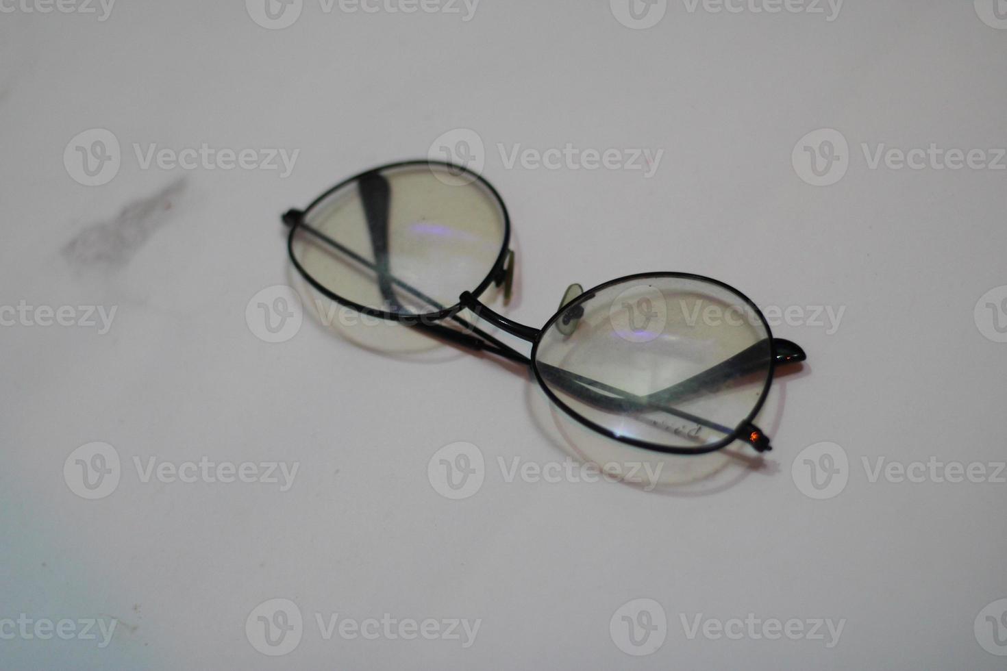 Photo of modern glasses with white background