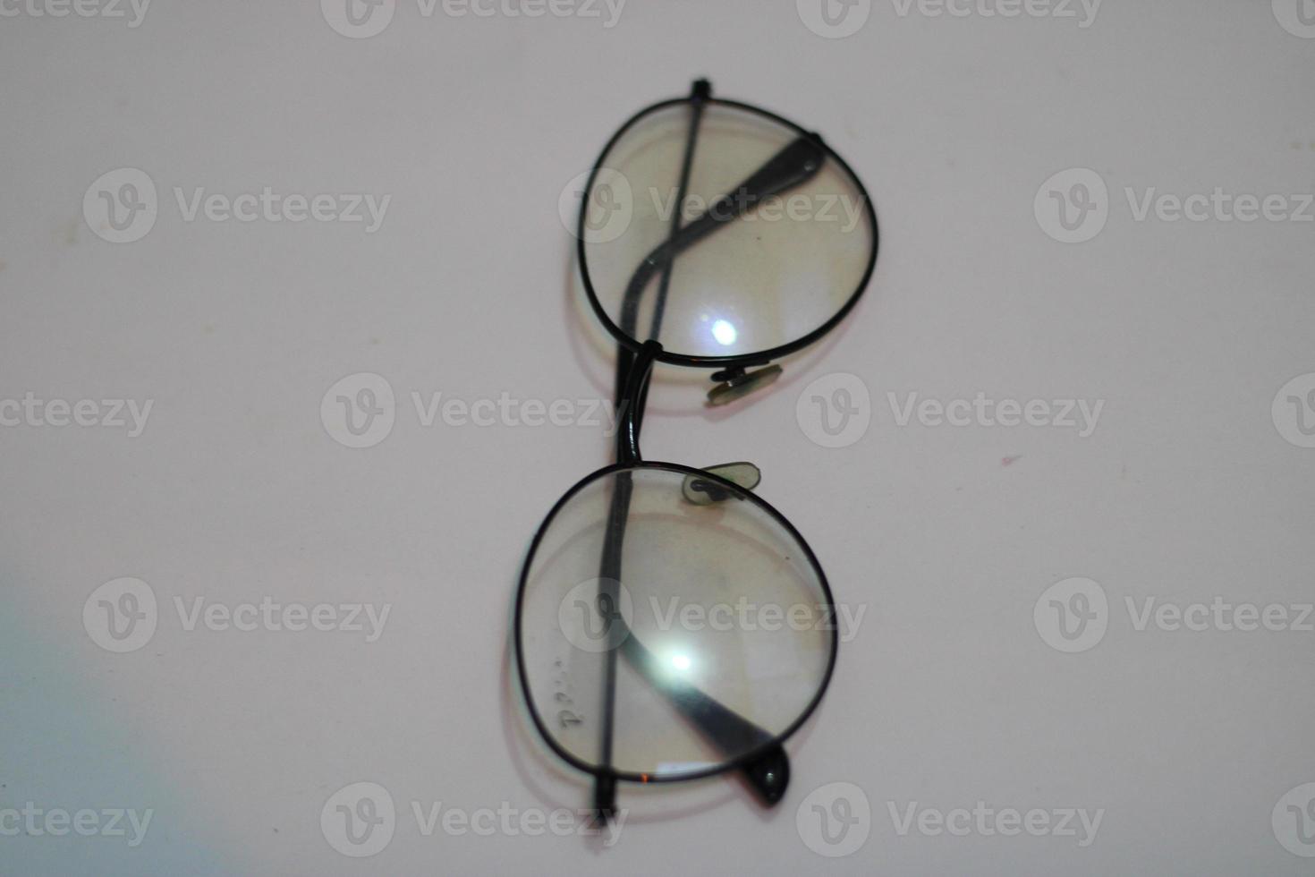 Photo of modern glasses with white background