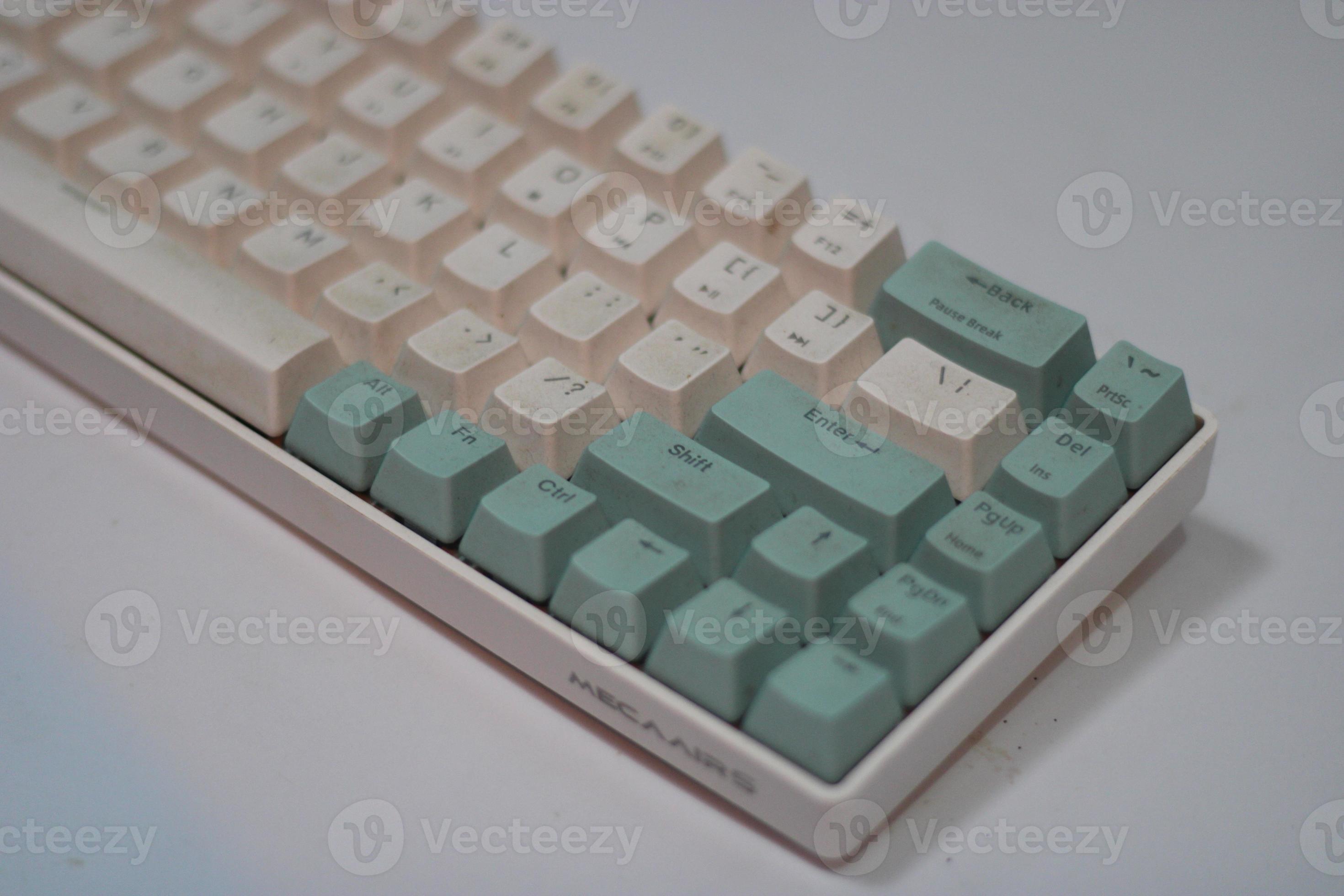photo of a white and light blue computer keyboard 22928505 Stock Photo