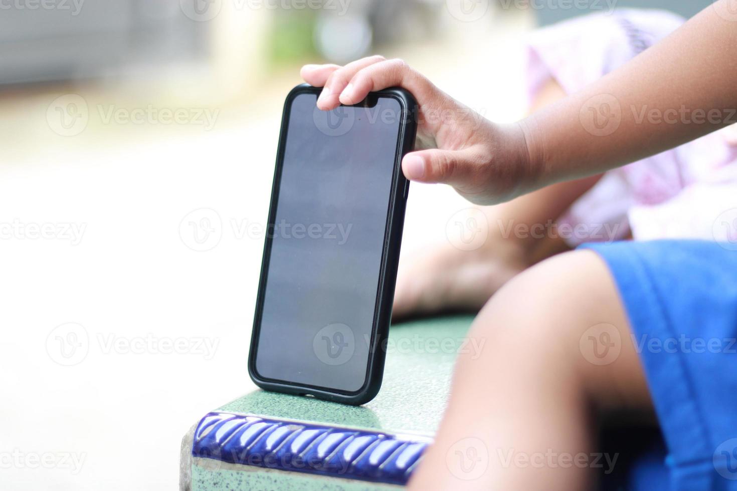 Photo of an empty cell phone held in hand