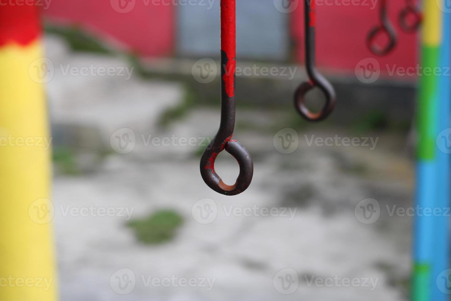 photo of an old iron hanger in a children's playground
