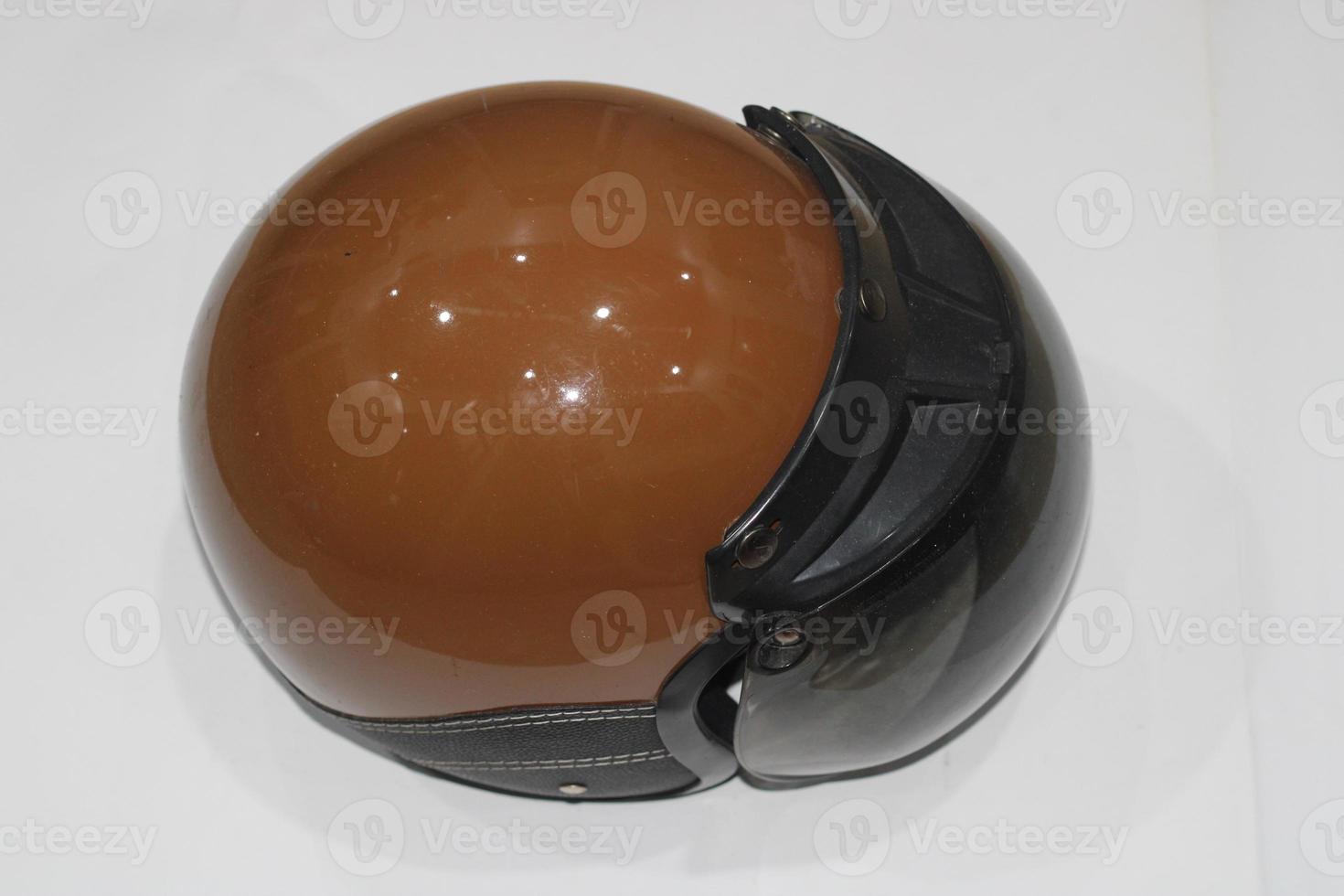 photo of brown helmet with black mirrors