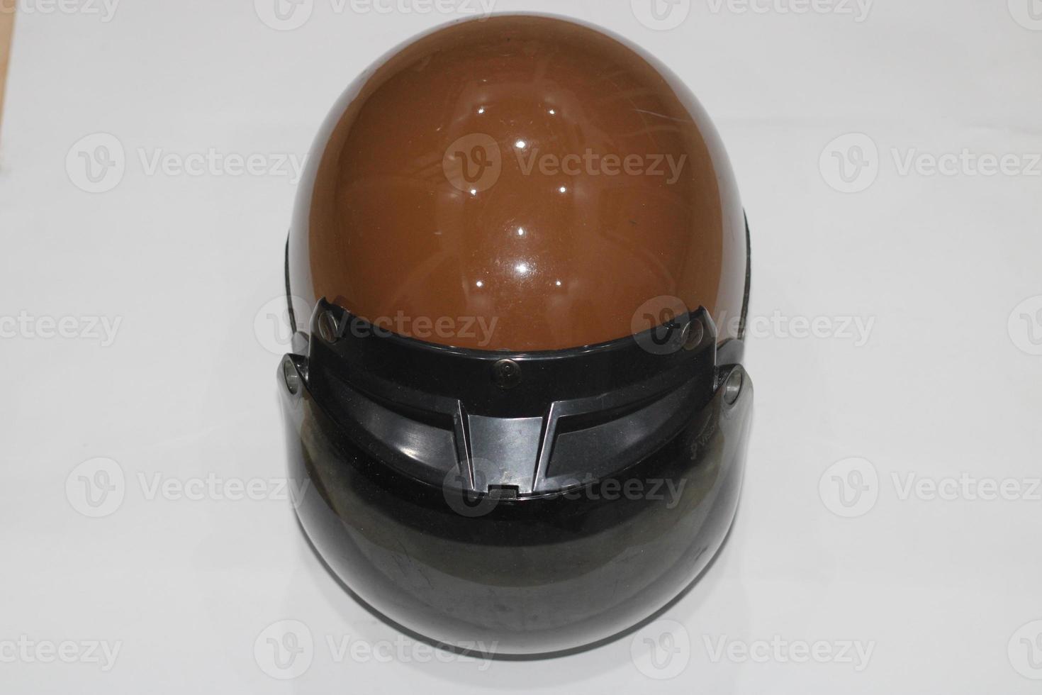 photo of brown helmet with black mirrors