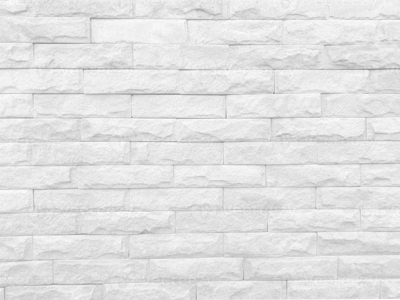 Seamless texture of white stone wall a rough surface, with space for text, for a background. photo