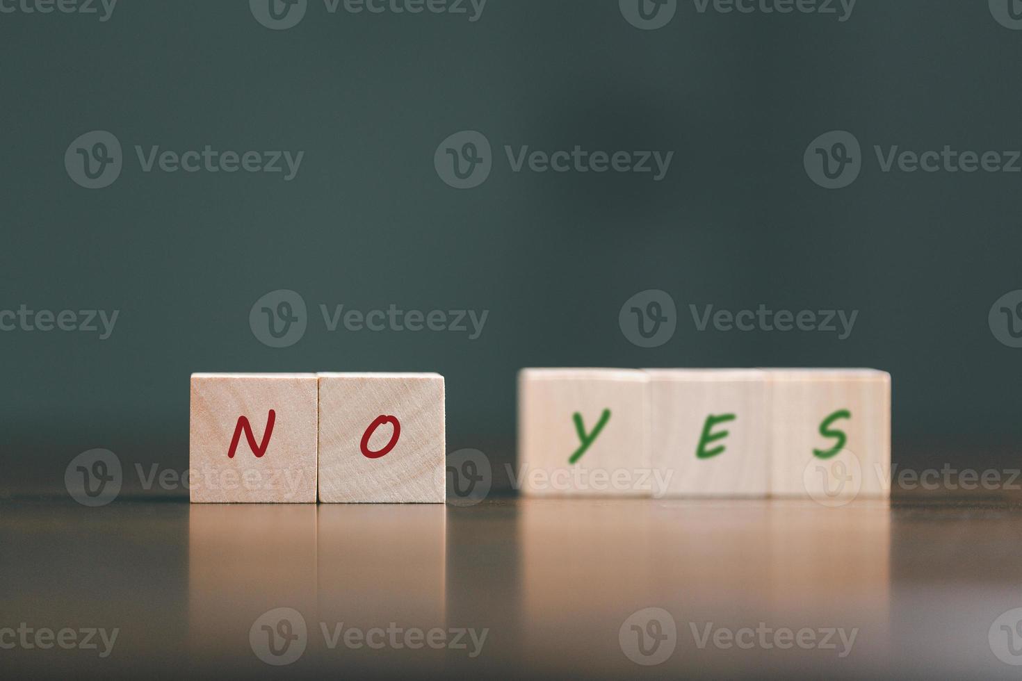 concept of choice yes or no on wooden cubic blocks. Business and lifestyle concept. Think With Yes Or No Choice, Business Choices For Difficult Situations, two wooden with yes or no word on it. photo