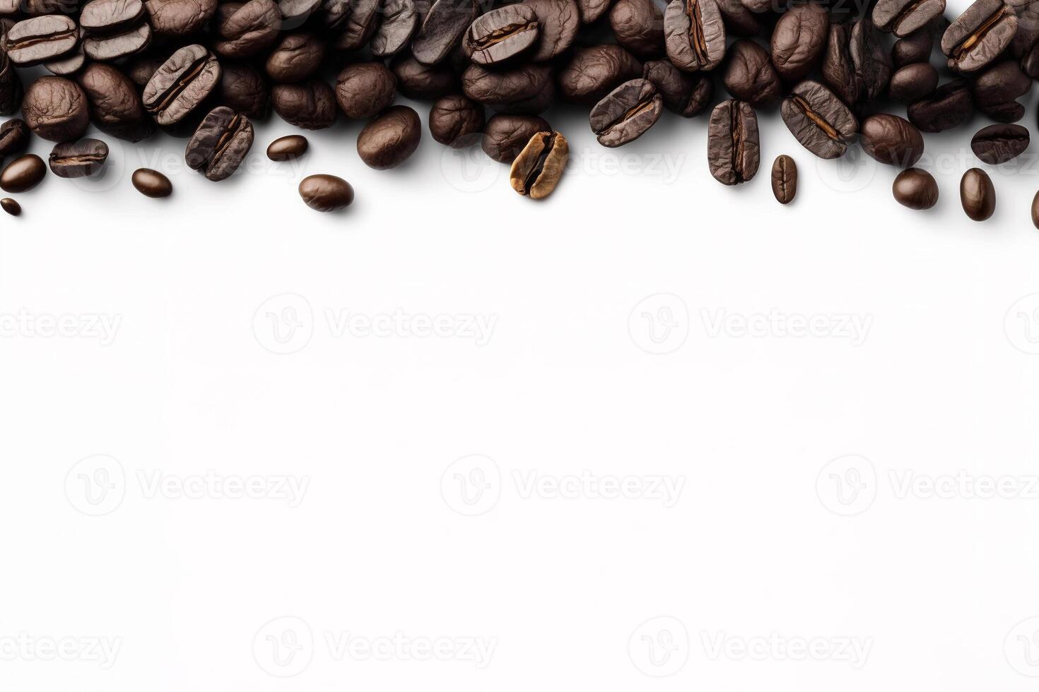 Roasted coffee beans on white background with copy space. photo