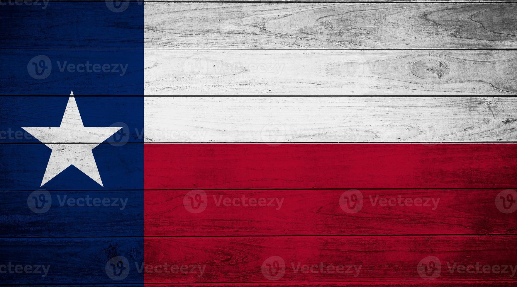 Flag of Texas on wooden old wall photo