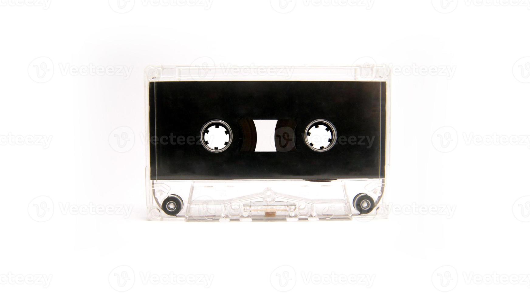 Audio cassette isolated on white background. Isolated retro media. 70's, 80's and 90's music technology. photo