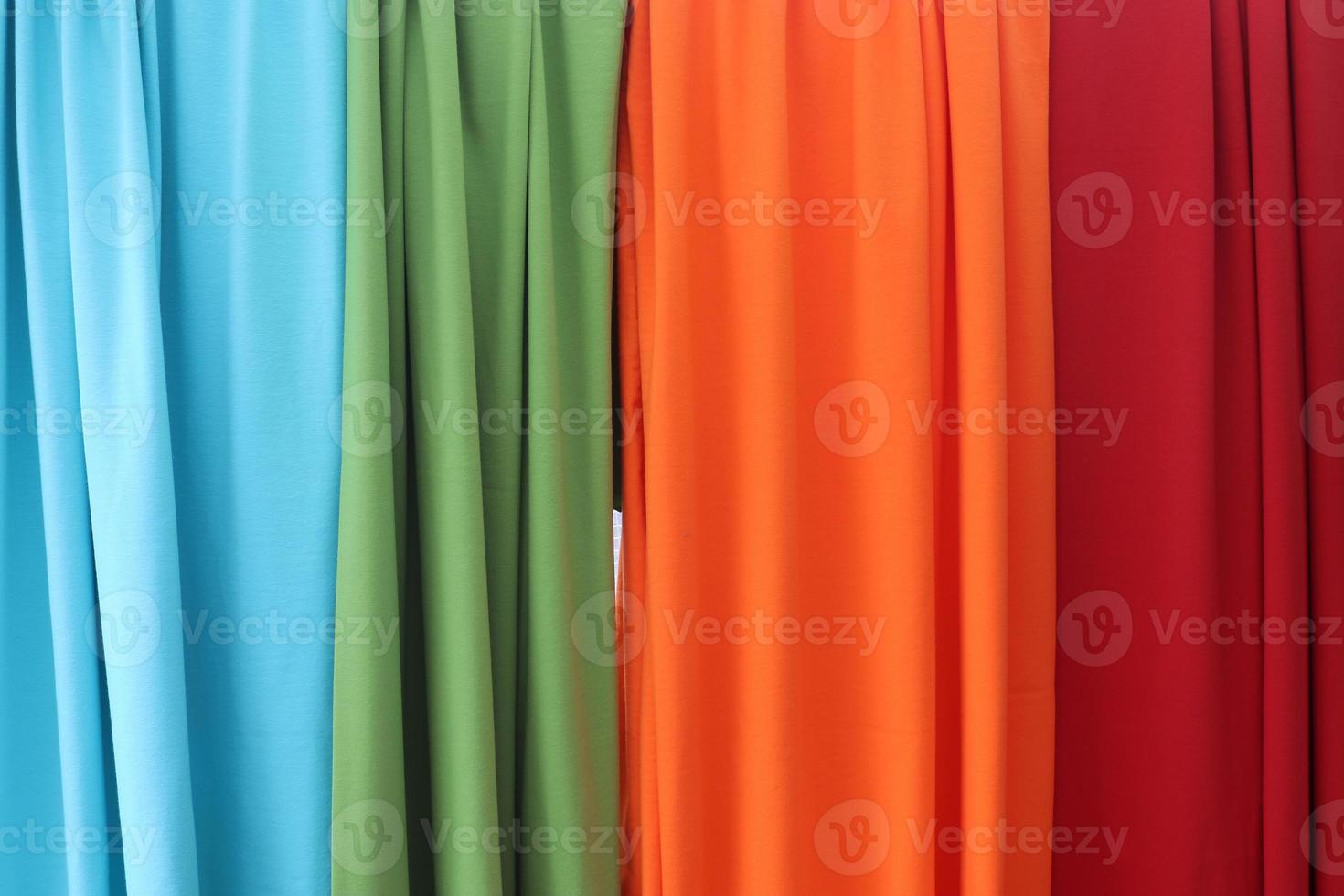 Samples of cloth and fabrics in different colors found at a fabrics market in Germany photo