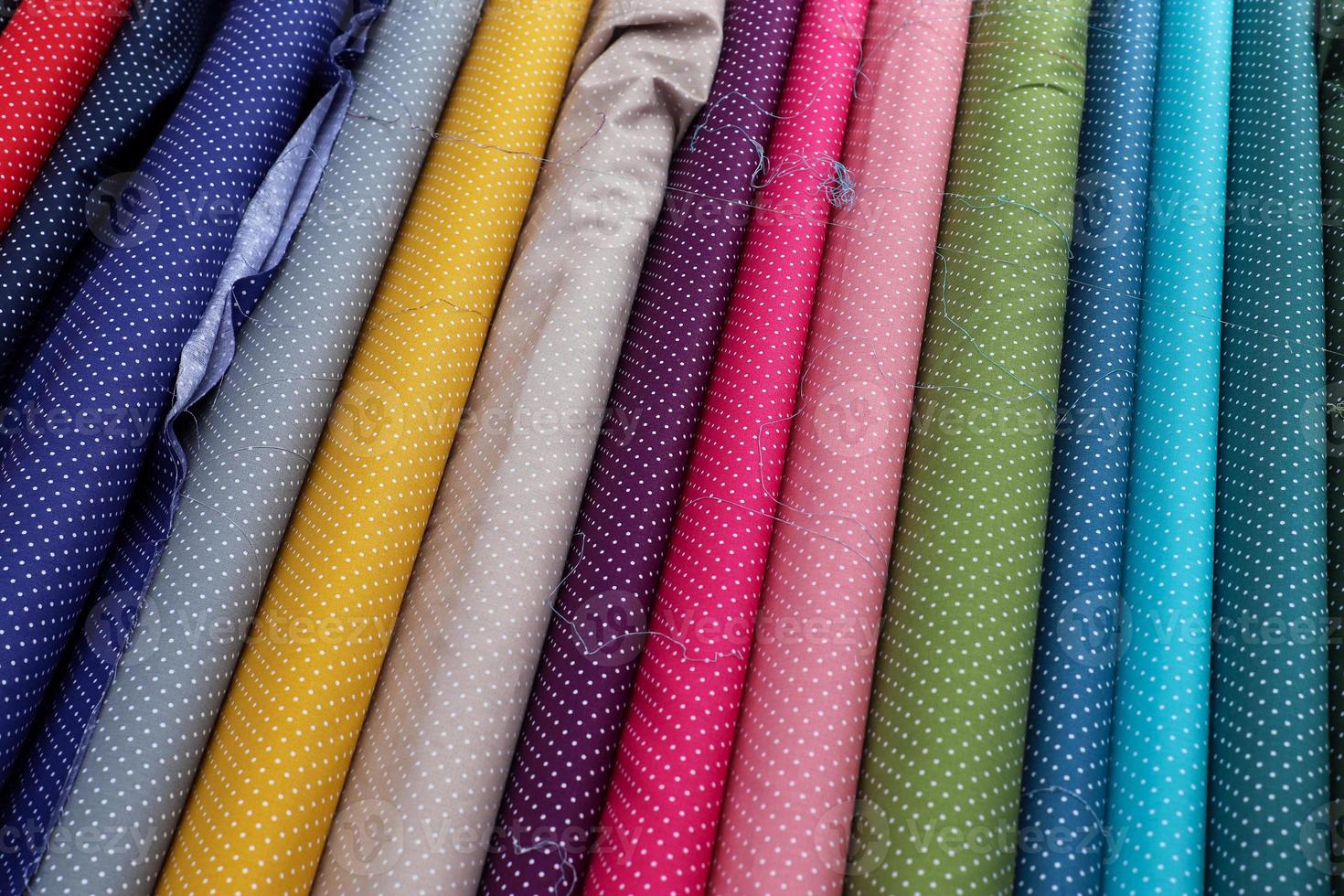 Samples of cloth and fabrics in different colors found at a fabrics market in Germany photo