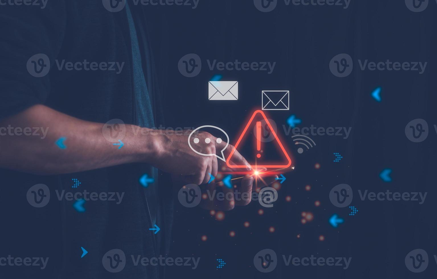 social media risk concept, man using smartphone play with media and caution sign, scam personal data protection and network security on internet photo