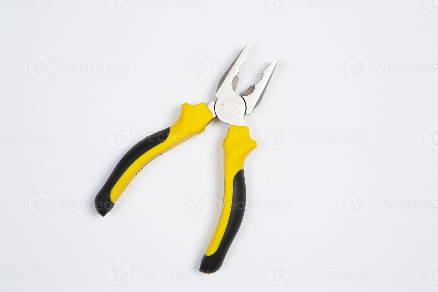 Set of tools for repair in a case on a white background. Assorted work or construction tools. Wrenches, Pliers, screwdriver. Top view photo