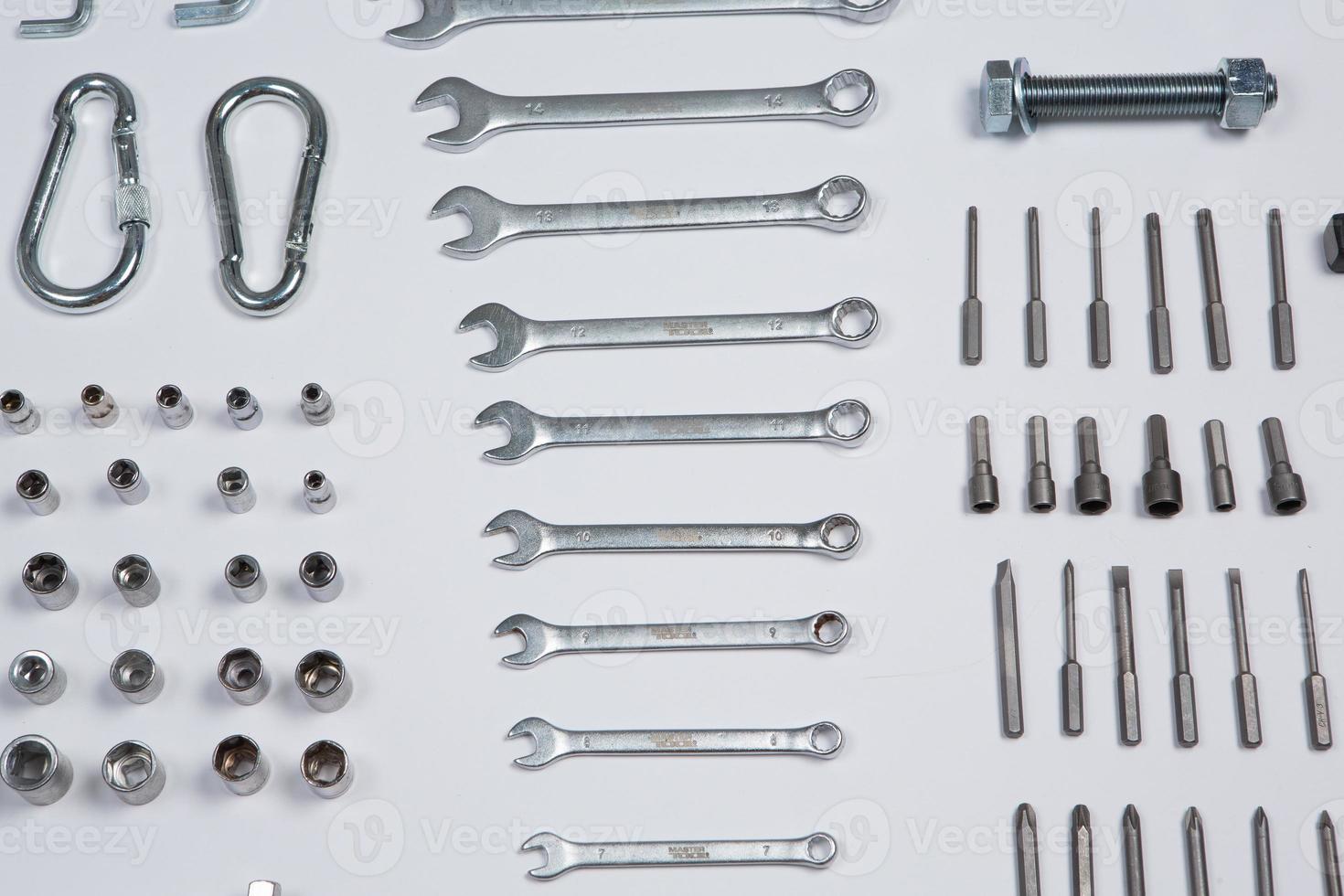 Set of tools for repair in a case on a white background. Assorted work or construction tools. Wrenches, Pliers, screwdriver. Top view photo